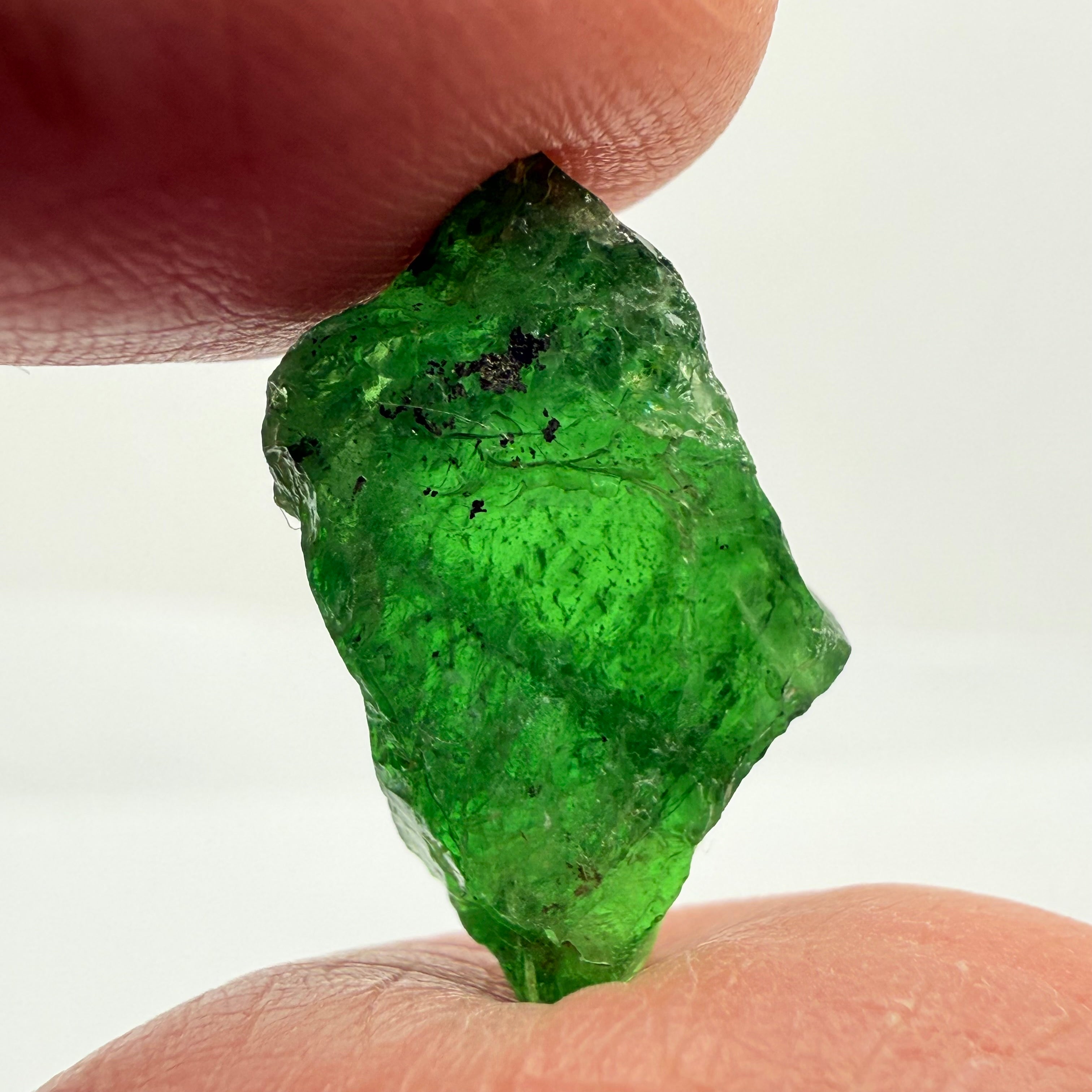 Tsavorite Garnet, 16.64ct, Tanzania, Untreated Unheated, cracks on the outside skin, full of veils, see backlit photos and videos