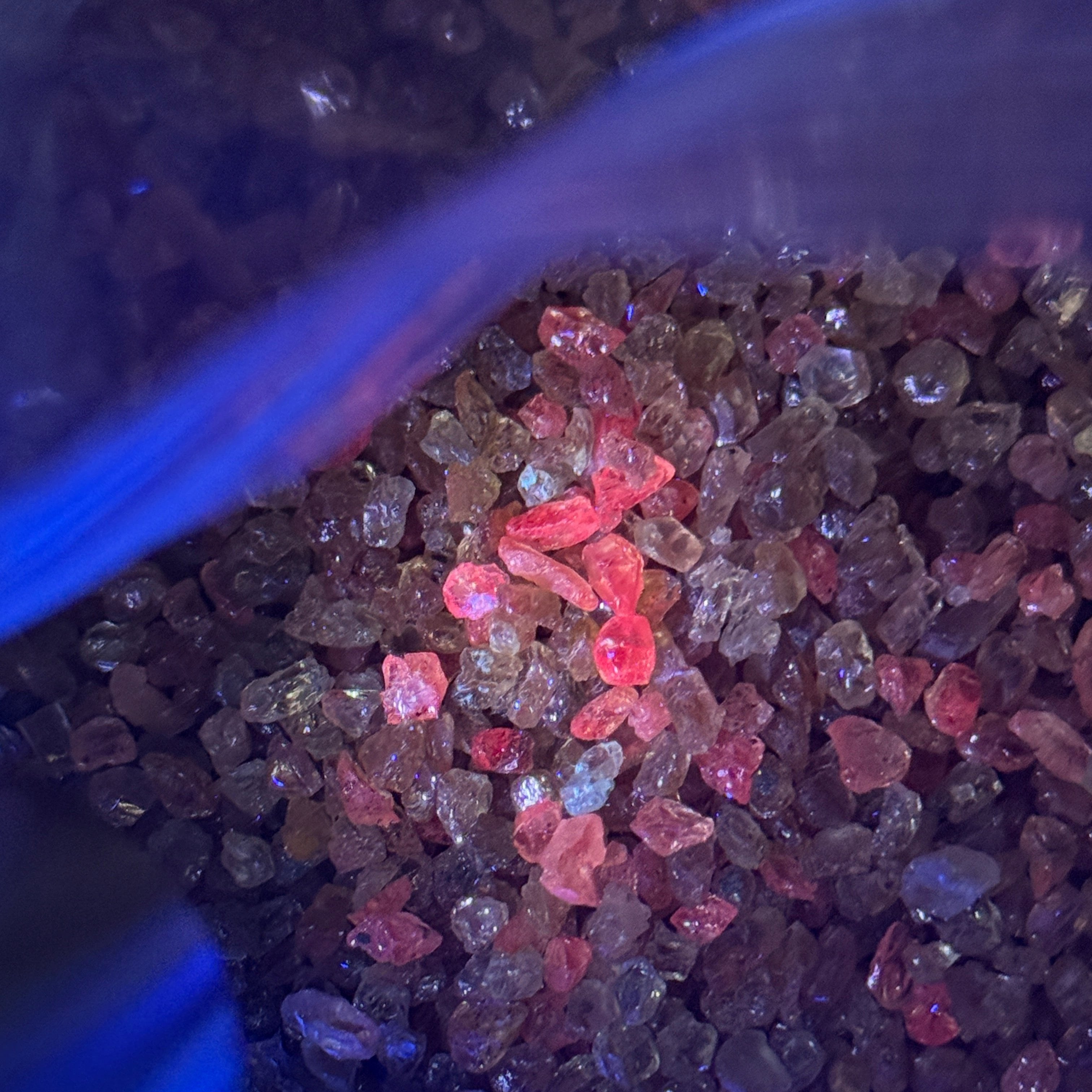 Dragon Garnet Melee Size Rough Lot, 1846gm / 9230ct, av size 0.22ct, Tanzania, price is for the lot, very small, use for melee, fish tank, artwork, anything really, almost all are fluorescent under uv, see pics and videos