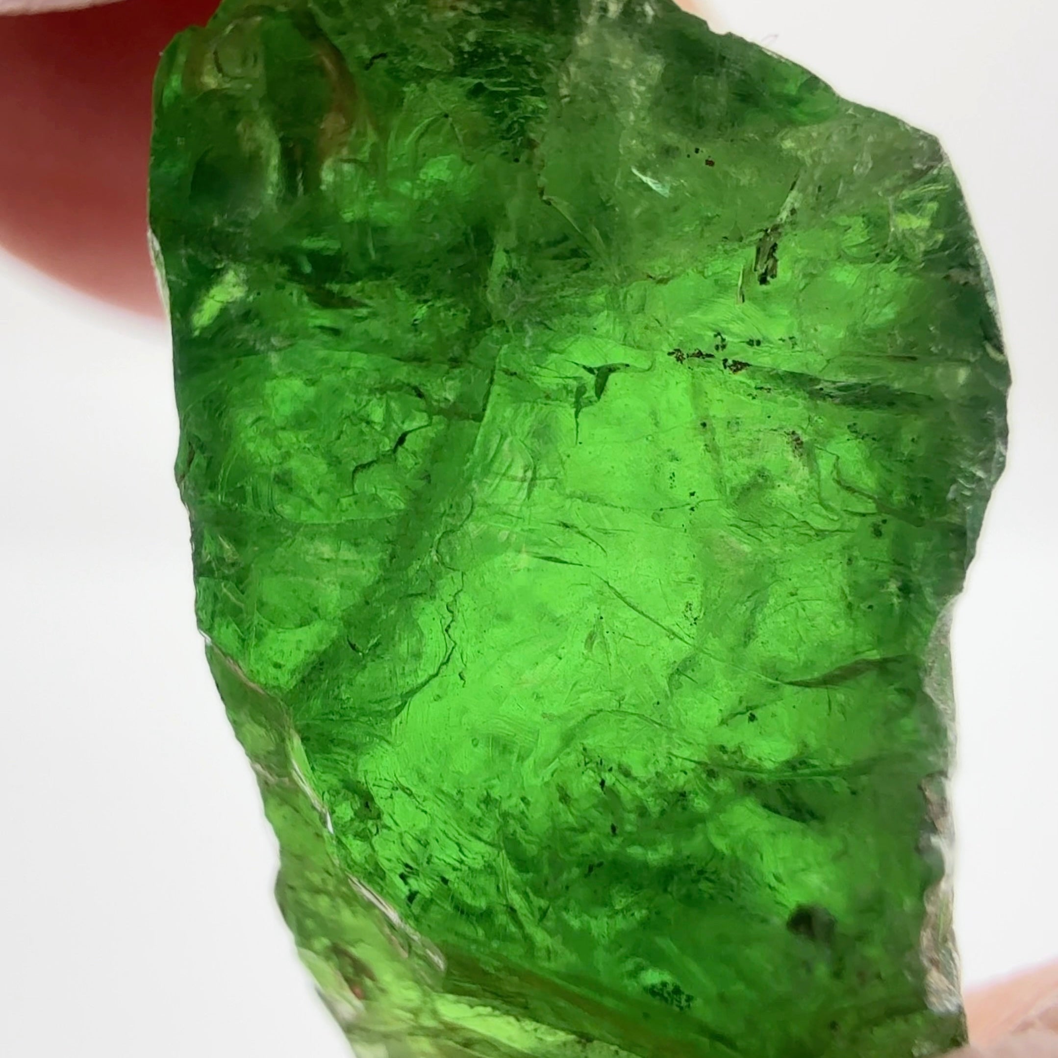 Tsavorite Garnet, 16.64ct, Tanzania, Untreated Unheated, cracks on the outside skin, full of veils, see backlit photos and videos