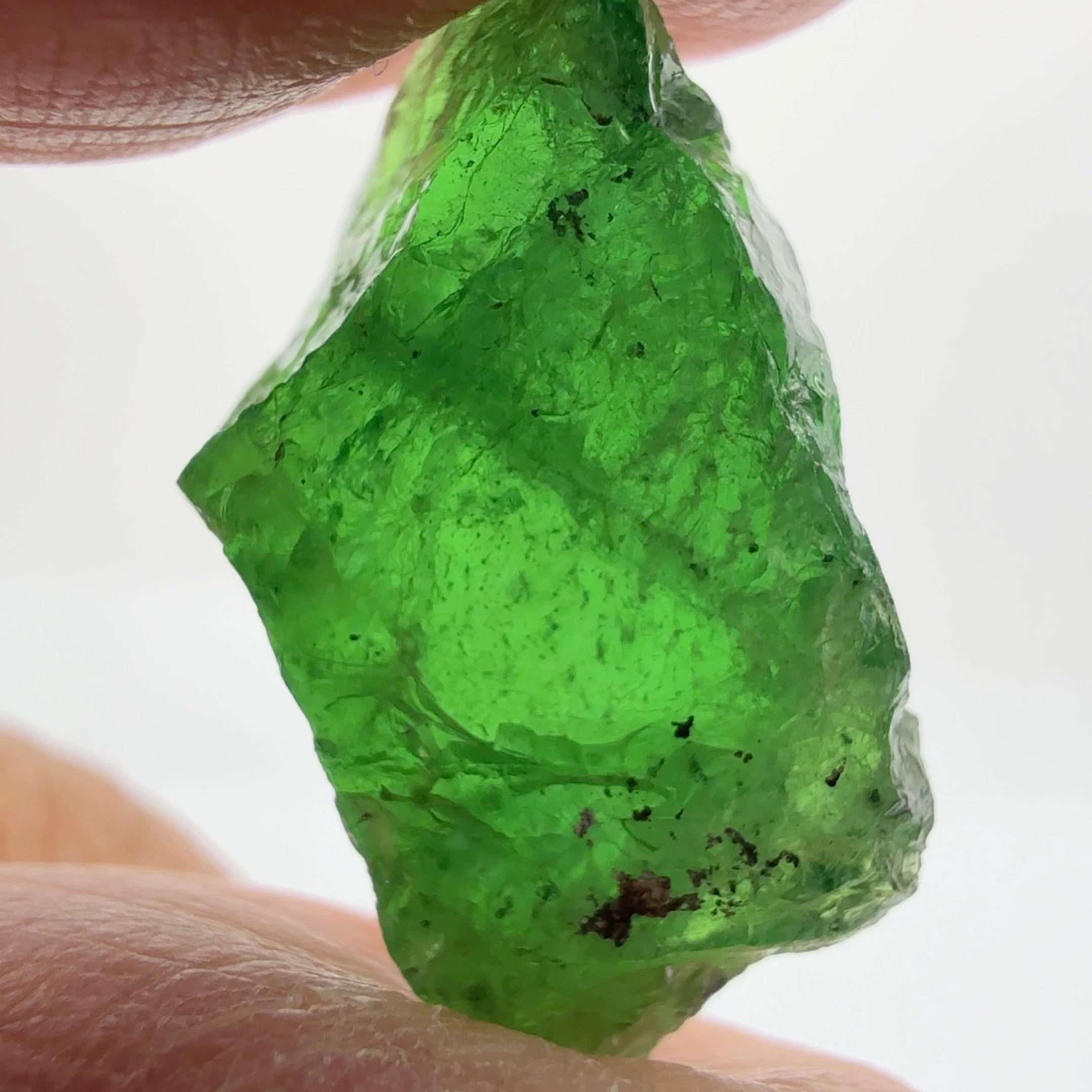 Tsavorite Garnet, 16.64ct, Tanzania, Untreated Unheated, cracks on the outside skin, full of veils, see backlit photos and videos