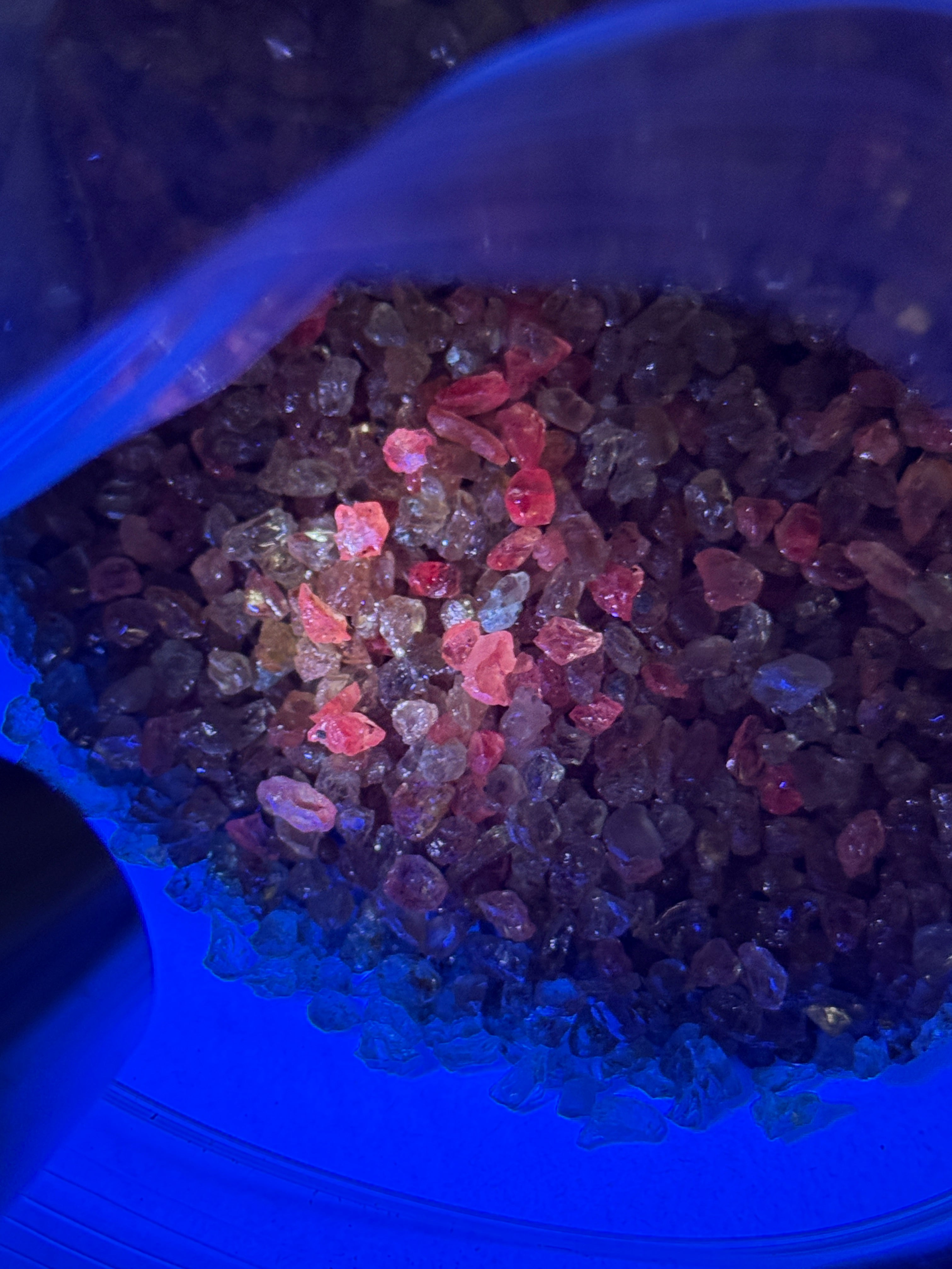 Dragon Garnet Melee Size Rough Lot, 1846gm / 9230ct, av size 0.22ct, Tanzania, price is for the lot, very small, use for melee, fish tank, artwork, anything really, almost all are fluorescent under uv, see pics and videos