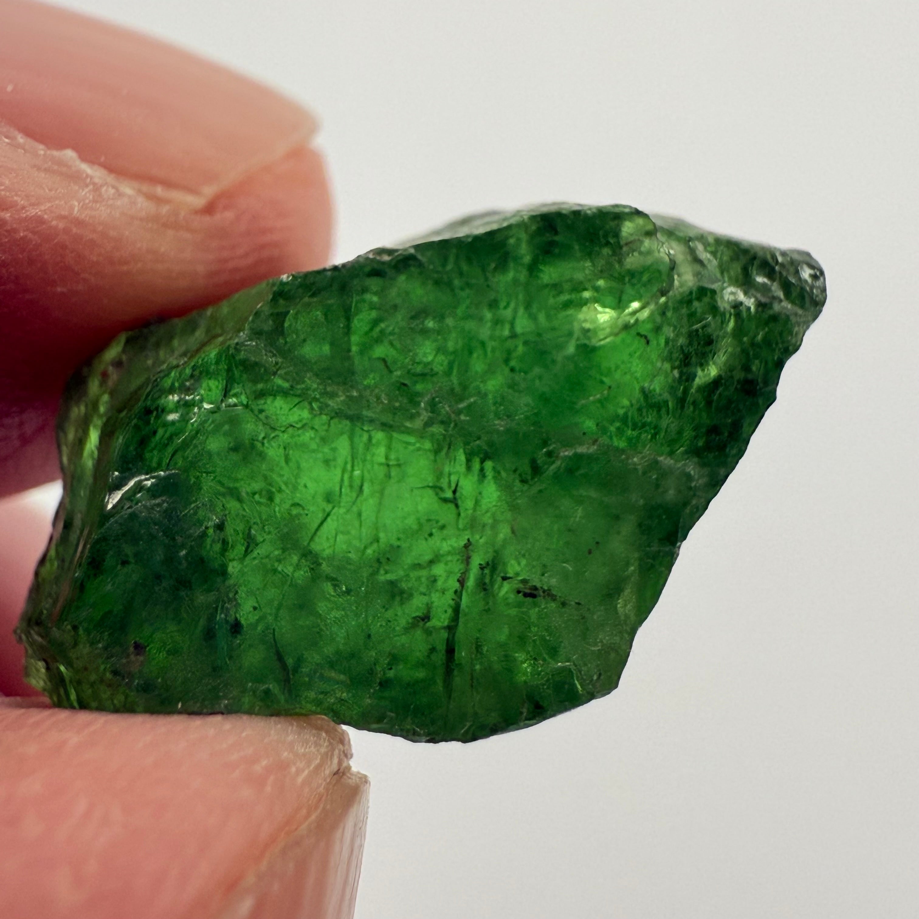 Tsavorite Garnet, 16.64ct, Tanzania, Untreated Unheated, cracks on the outside skin, full of veils, see backlit photos and videos