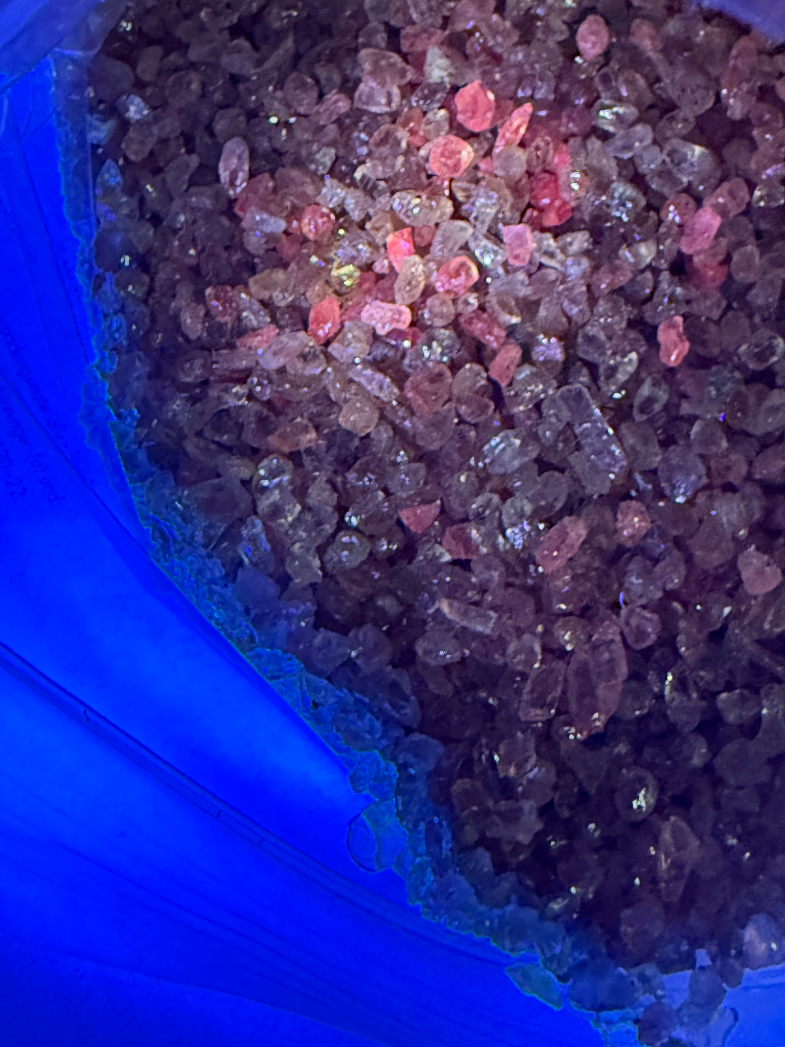 Dragon Garnet Melee Size Rough Lot, 1846gm / 9230ct, av size 0.22ct, Tanzania, price is for the lot, very small, use for melee, fish tank, artwork, anything really, almost all are fluorescent under uv, see pics and videos