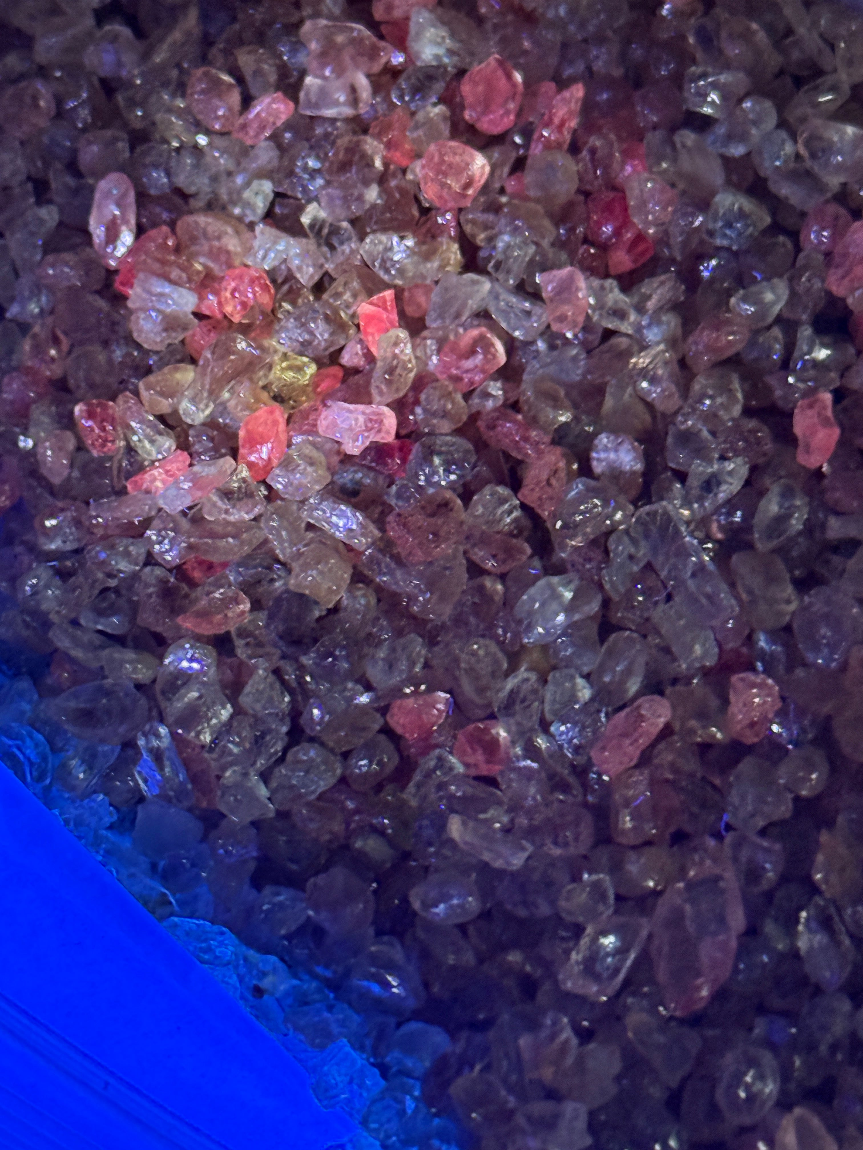 Dragon Garnet Melee Size Rough Lot, 1846gm / 9230ct, av size 0.22ct, Tanzania, price is for the lot, very small, use for melee, fish tank, artwork, anything really, almost all are fluorescent under uv, see pics and videos