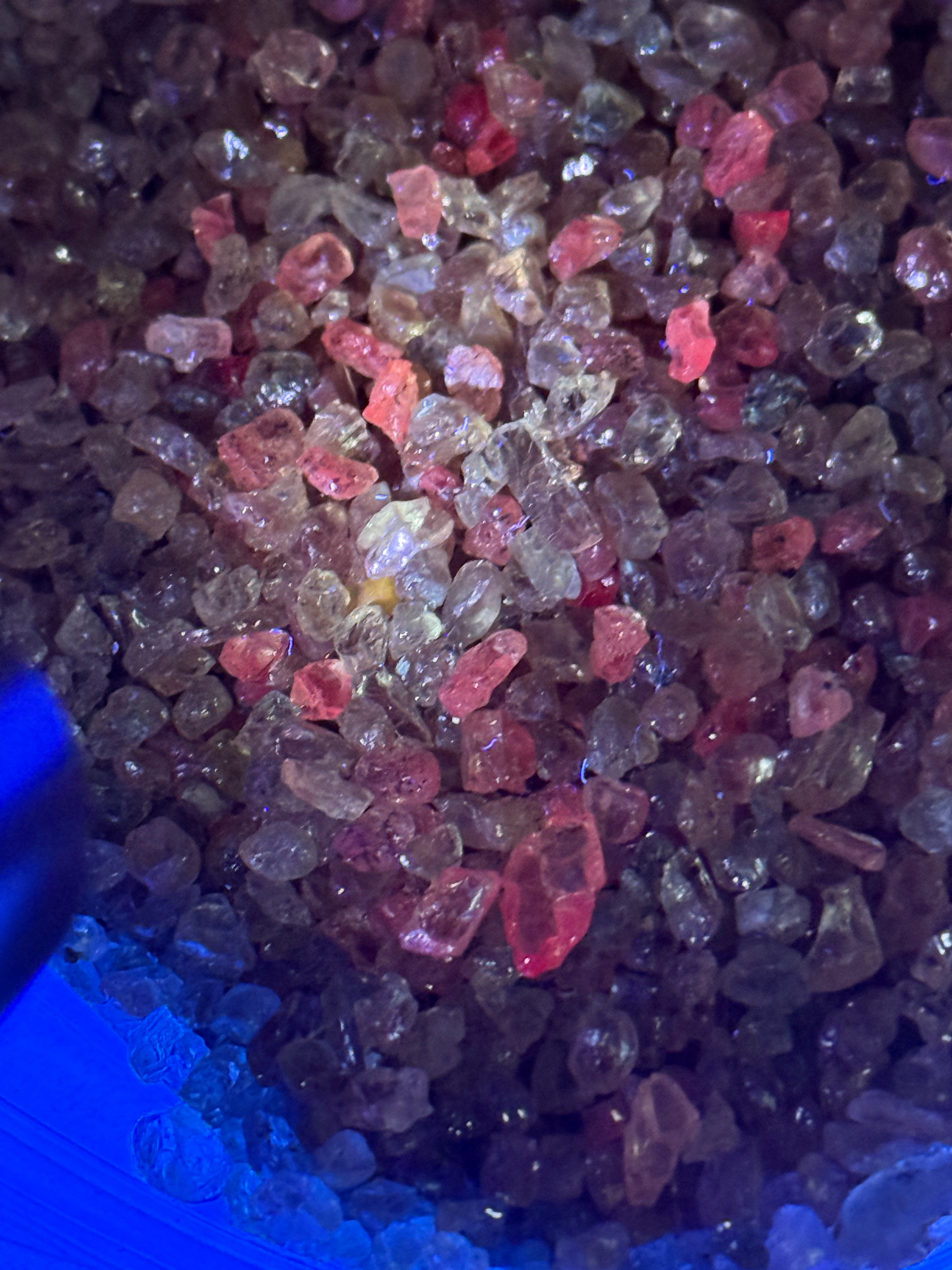 Dragon Garnet Melee Size Rough Lot, 1846gm / 9230ct, av size 0.22ct, Tanzania, price is for the lot, very small, use for melee, fish tank, artwork, anything really, almost all are fluorescent under uv, see pics and videos