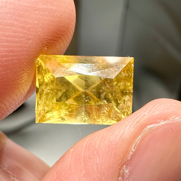 Vivid Intense Yellow Golden Danburite, 8.035ct, Tanzania, Untreated Unheated. Slightly included. Super rare. High brilliance and vivid. Precision Cut. 12.8 x 9 x 8.8mm