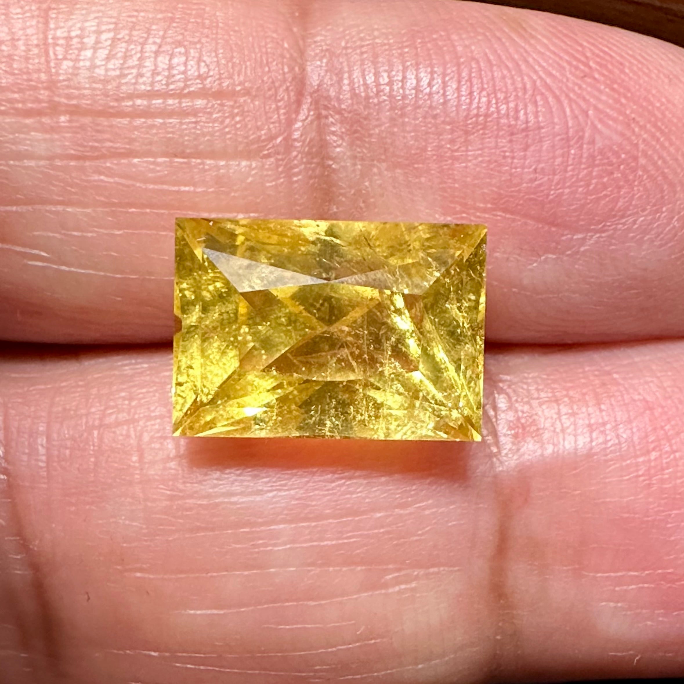 Vivid Intense Yellow Golden Danburite, 8.035ct, Tanzania, Untreated Unheated. Slightly included. Super rare. High brilliance and vivid. Precision Cut. 12.8 x 9 x 8.8mm