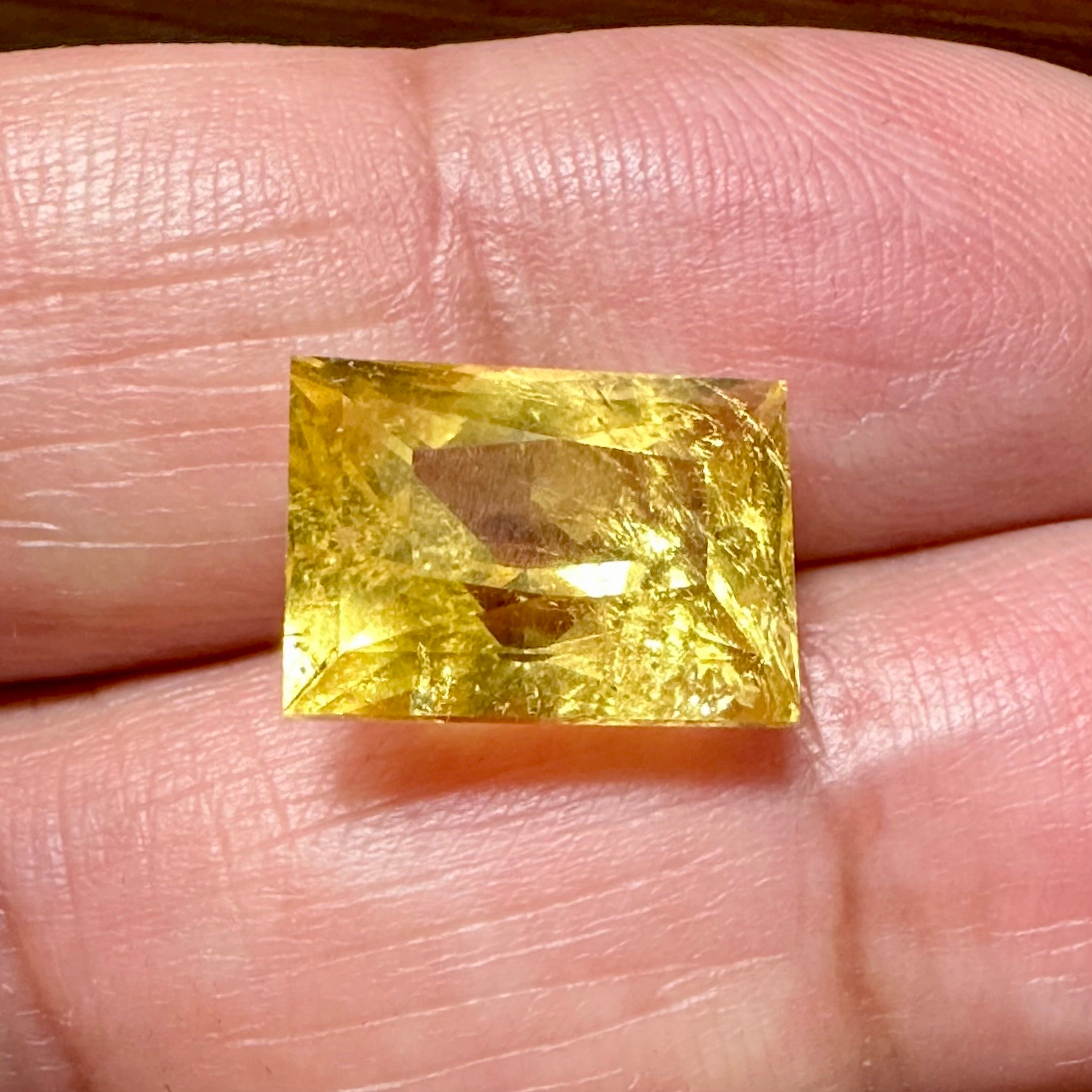 Vivid Intense Yellow Golden Danburite, 8.035ct, Tanzania, Untreated Unheated. Slightly included. Super rare. High brilliance and vivid. Precision Cut. 12.8 x 9 x 8.8mm