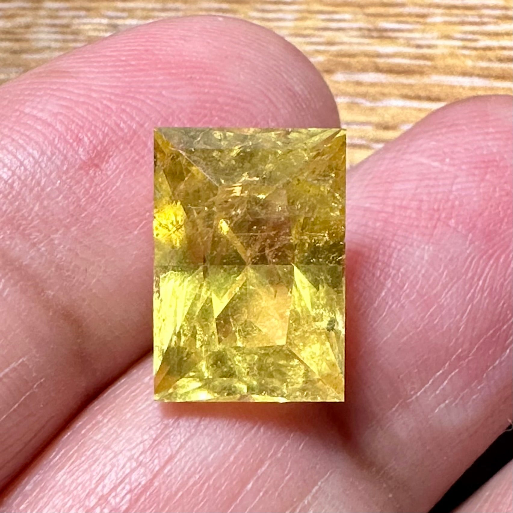 Vivid Intense Yellow Golden Danburite, 8.035ct, Tanzania, Untreated Unheated. Slightly included. Super rare. High brilliance and vivid. Precision Cut. 12.8 x 9 x 8.8mm