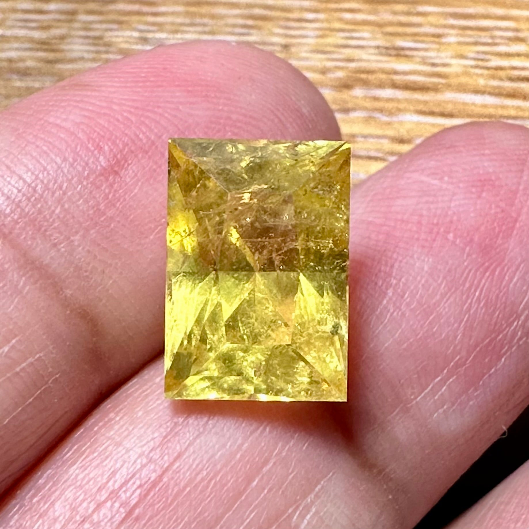 Vivid Intense Yellow Golden Danburite, 8.035ct, Tanzania, Untreated Unheated. Slightly included. Super rare. High brilliance and vivid. Precision Cut. 12.8 x 9 x 8.8mm