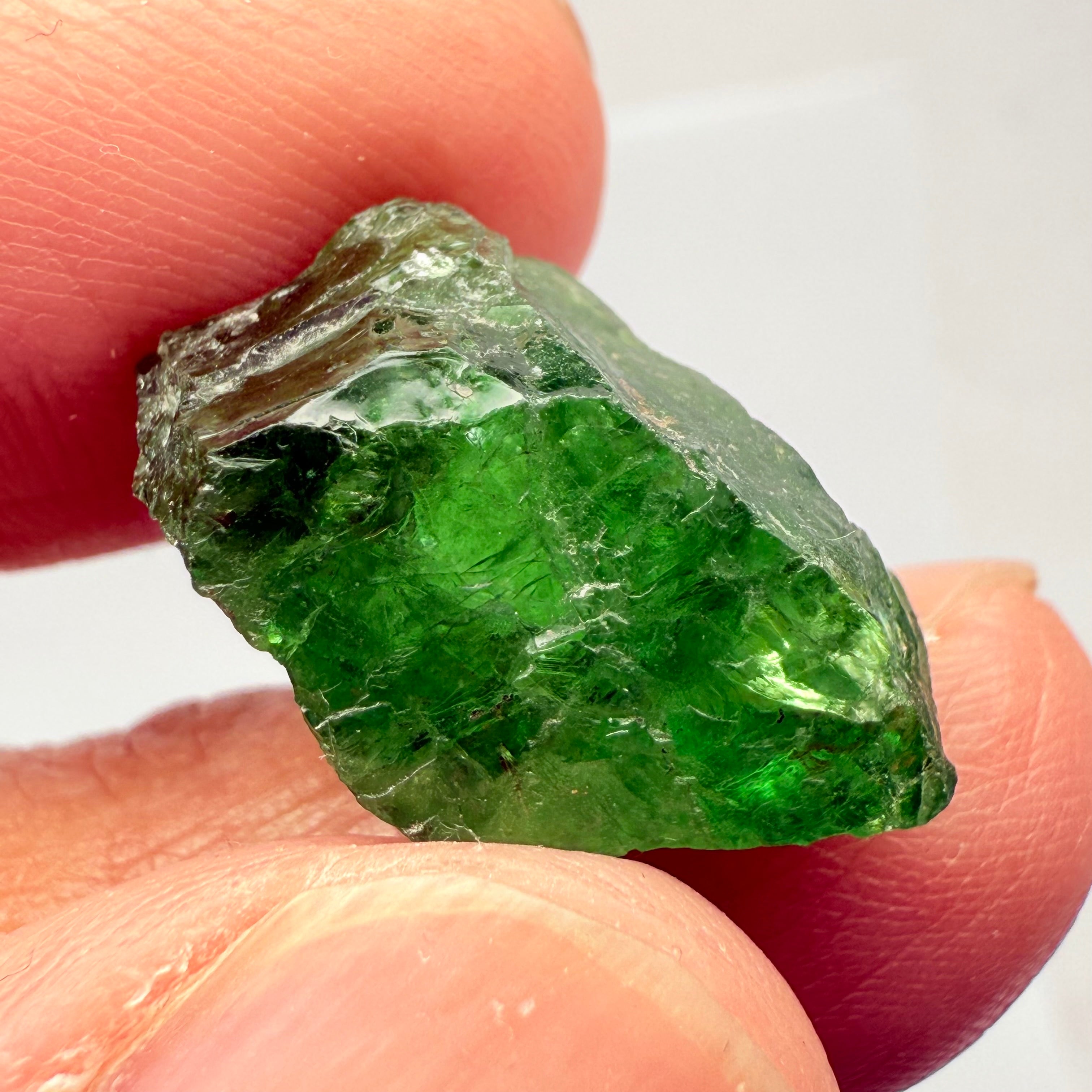 Tsavorite Garnet, 16.64ct, Tanzania, Untreated Unheated, cracks on the outside skin, full of veils, see backlit photos and videos