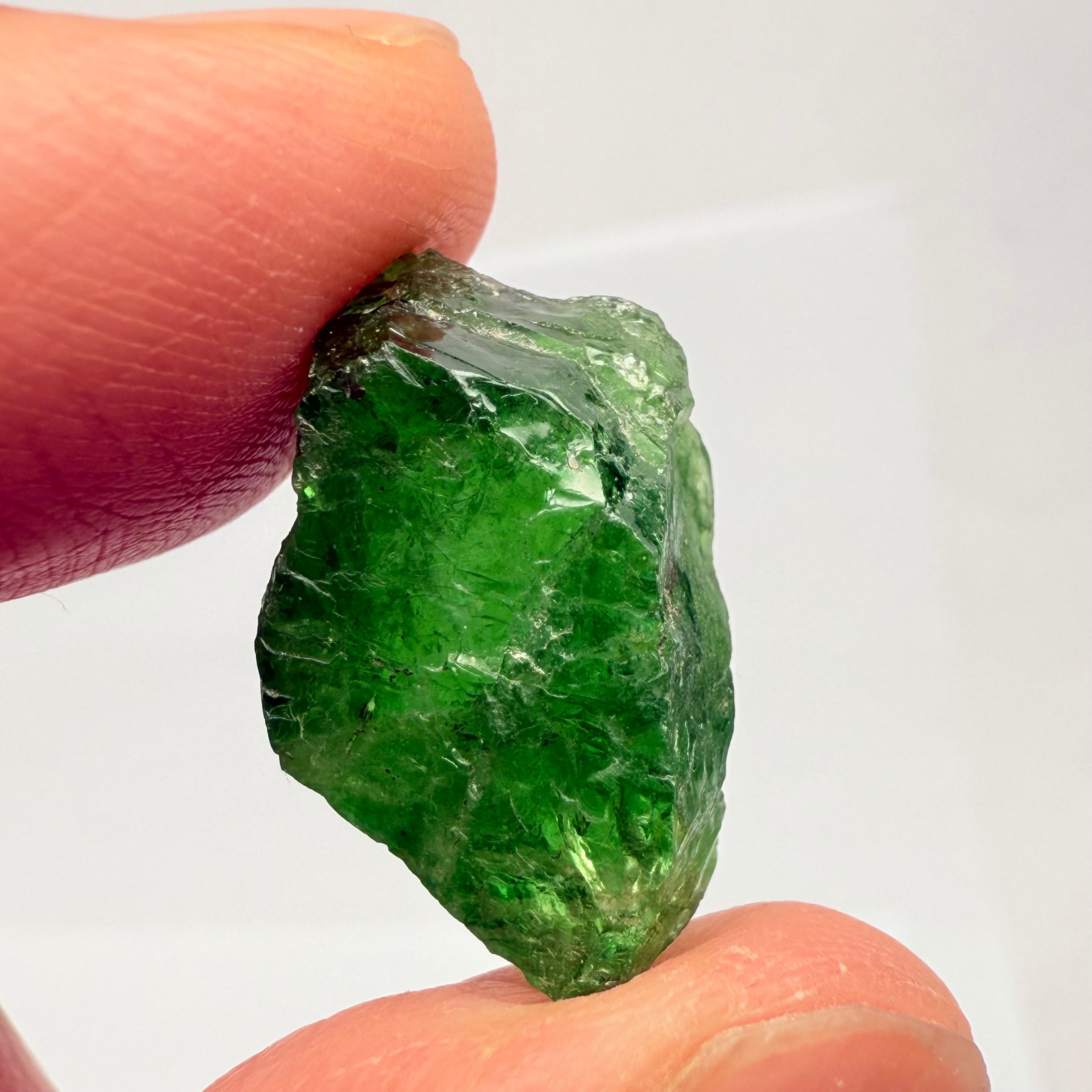 Tsavorite Garnet, 16.64ct, Tanzania, Untreated Unheated, cracks on the outside skin, full of veils, see backlit photos and videos