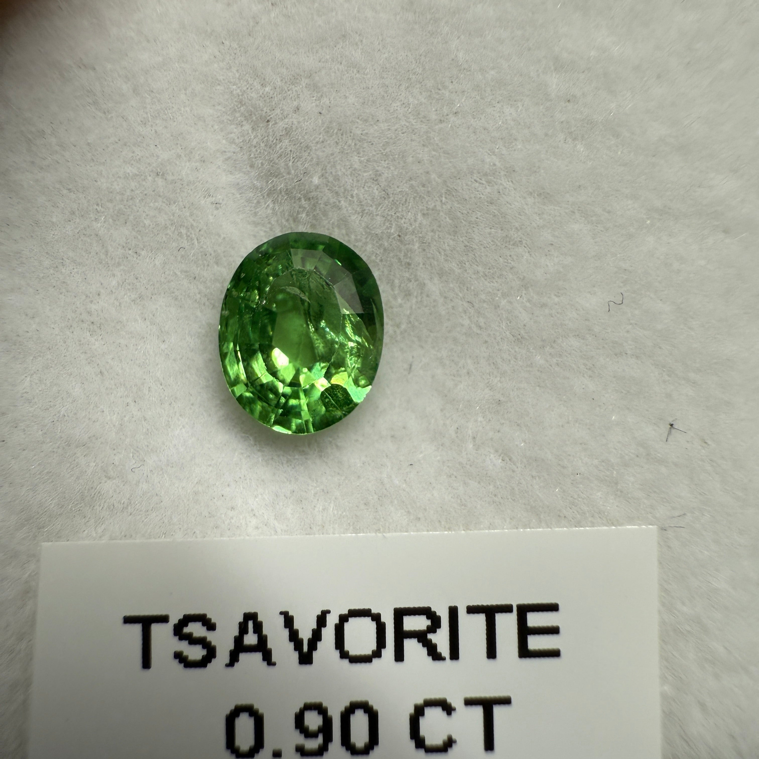 Tsavorite Garnet, 0.90ct, Kenya, Unheated Untreated, slight chip on crown facet, native cut.