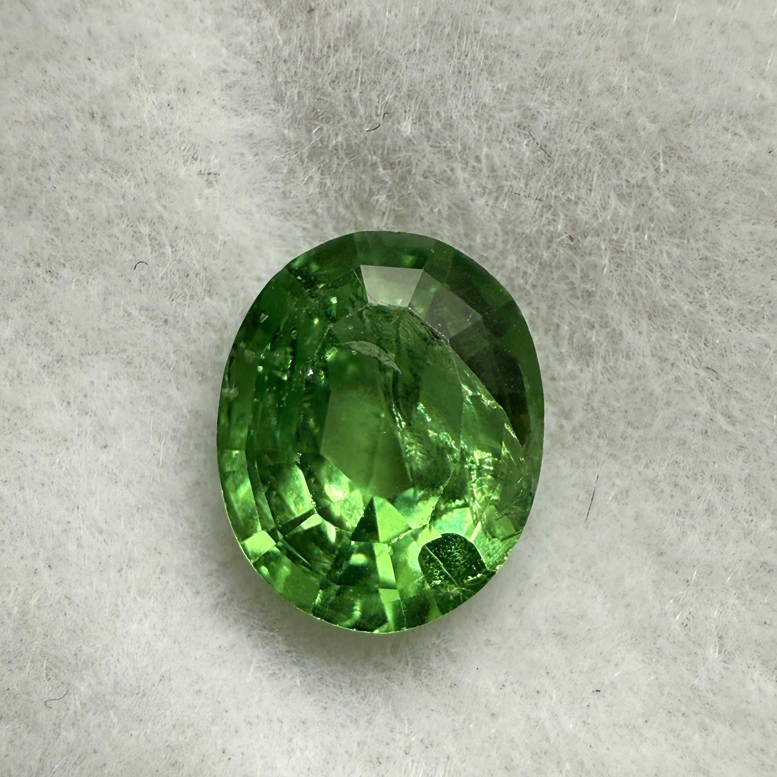 Tsavorite Garnet, 0.90ct, Kenya, Unheated Untreated, slight chip on crown facet, native cut.