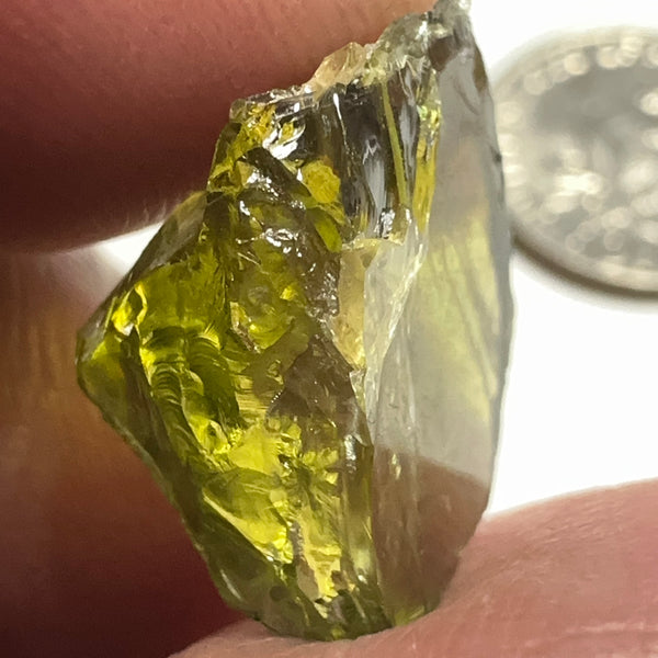 10.16ct Sphene, Mondo, Tanzania, Untreated Unheated, issues that need to be removed on faceting, or cut with inclusions, some cracks on the outside skin