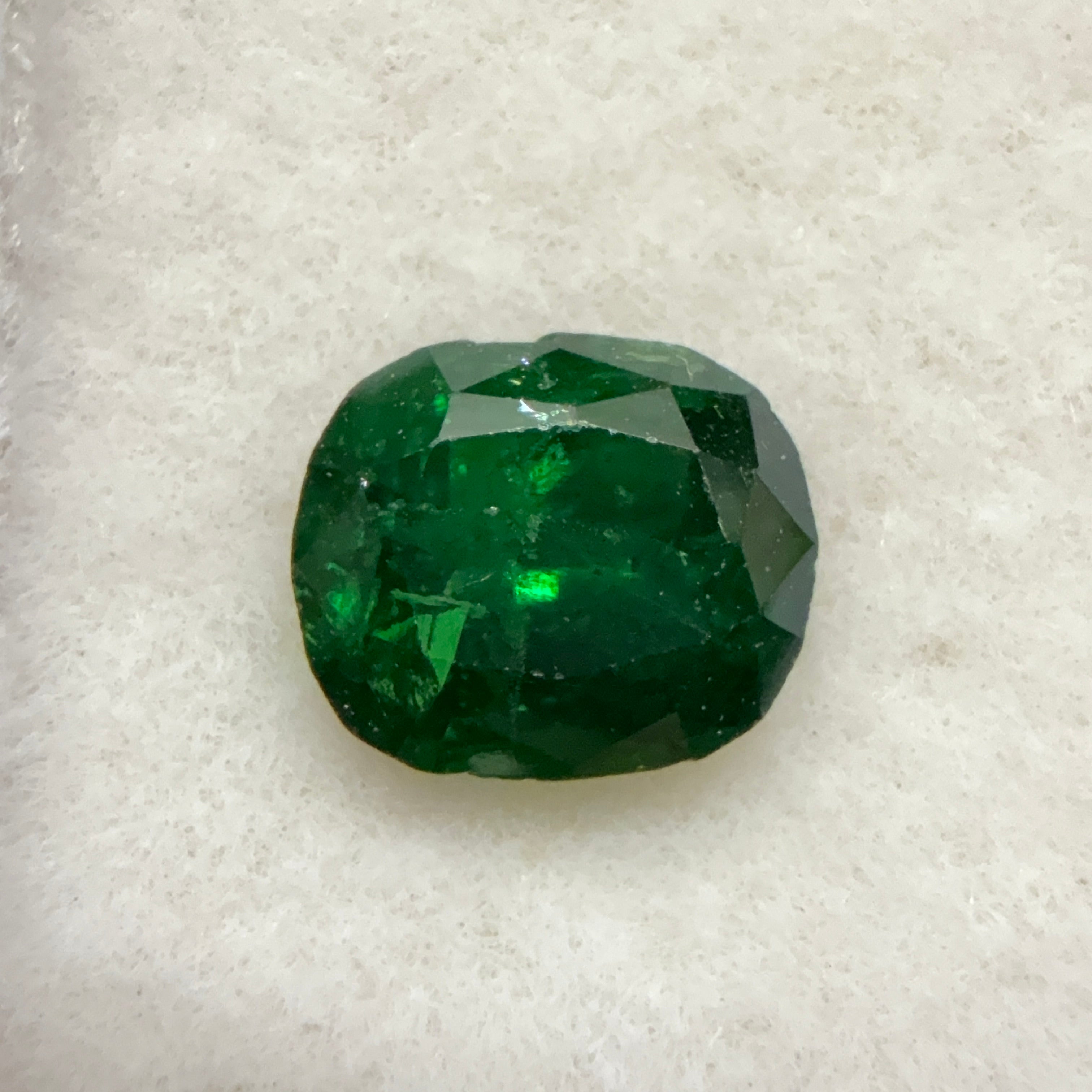 Tsavorite Garnet, 0.80ct, Kenya, Unheated Untreated, girdle has a slight chip if you can see it, native cut.