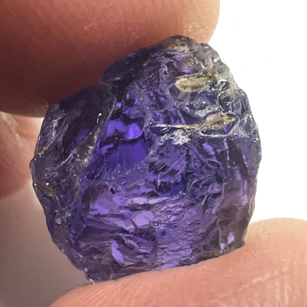 16.60ct Purple Scapolite Crystal, Tanzania, Untreated Unheated.VVS-IF clean with a single tiny spot 3mm into the stone, you can cut with it, will not be seen with the naked eye once cut, there is a crack on the outside which will come off in pre-forming