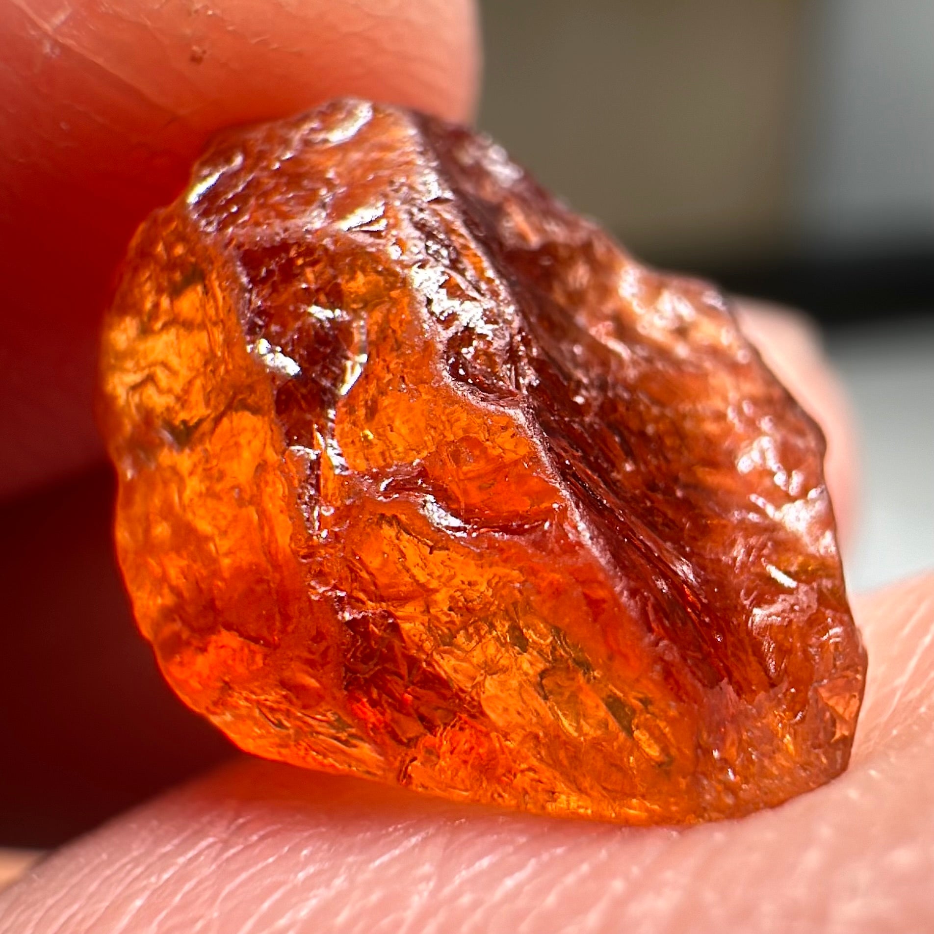 Mandarin Carrot Colour Spessartite Garnet, 5.51ct, Loliondo, Tanzania. Untreated Unheated. Slight crack on outside coming 2mm into stone, rest very slight sugar