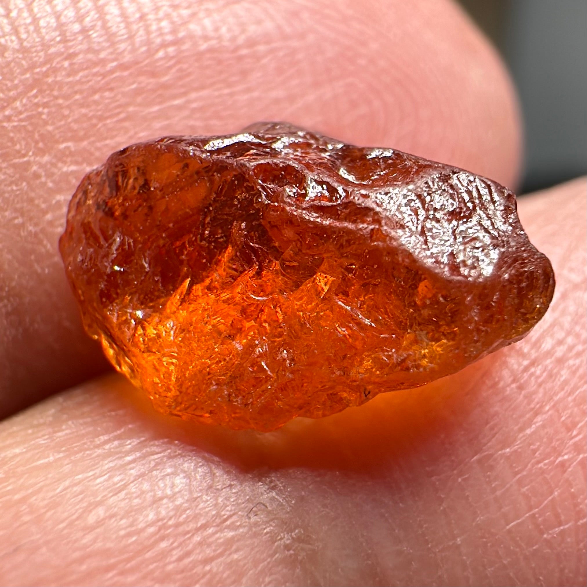 Mandarin Carrot Colour Spessartite Garnet, 5.51ct, Loliondo, Tanzania. Untreated Unheated. Slight crack on outside coming 2mm into stone, rest very slight sugar