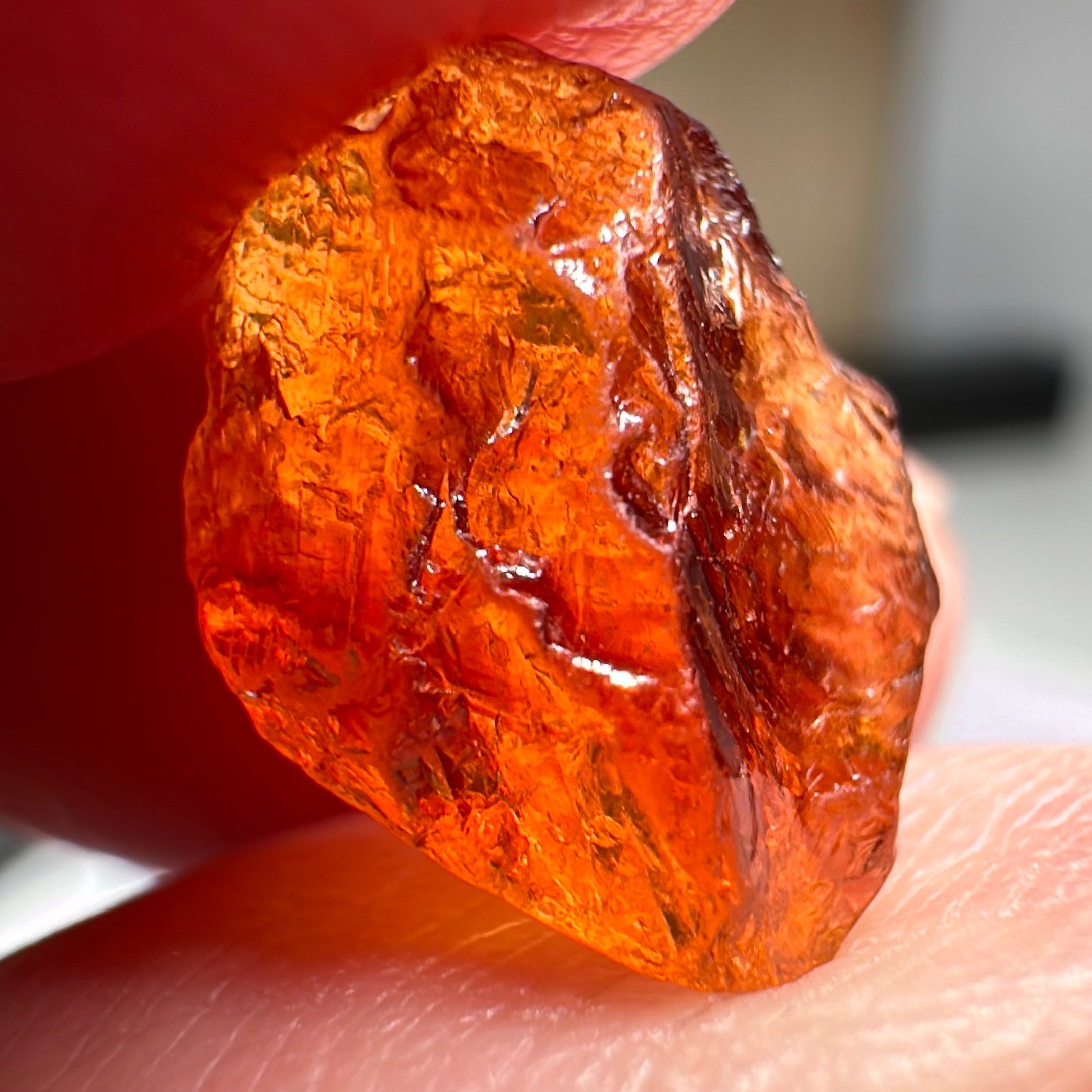 Mandarin Carrot Colour Spessartite Garnet, 5.51ct, Loliondo, Tanzania. Untreated Unheated. Slight crack on outside coming 2mm into stone, rest very slight sugar