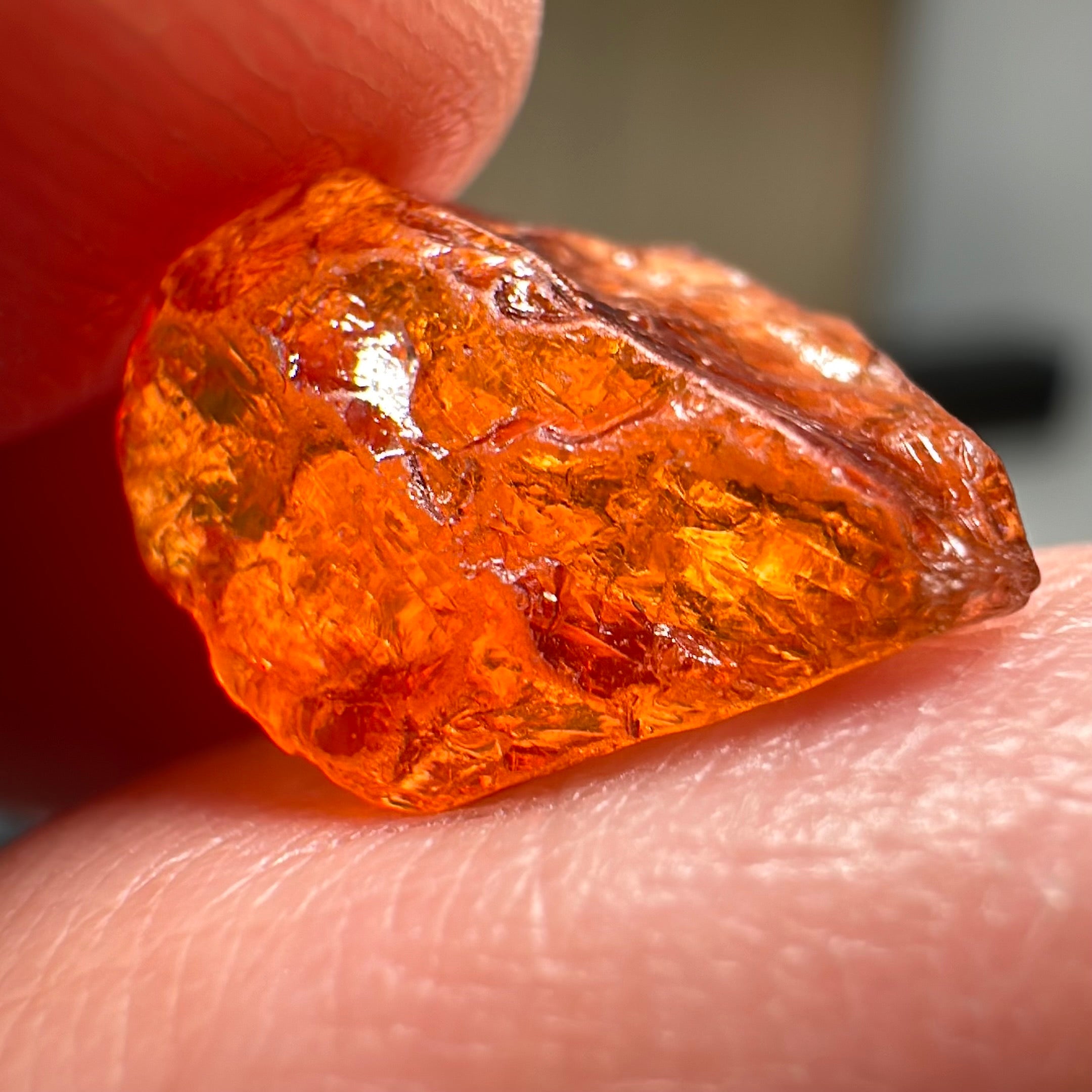 Mandarin Carrot Colour Spessartite Garnet, 5.51ct, Loliondo, Tanzania. Untreated Unheated. Slight crack on outside coming 2mm into stone, rest very slight sugar