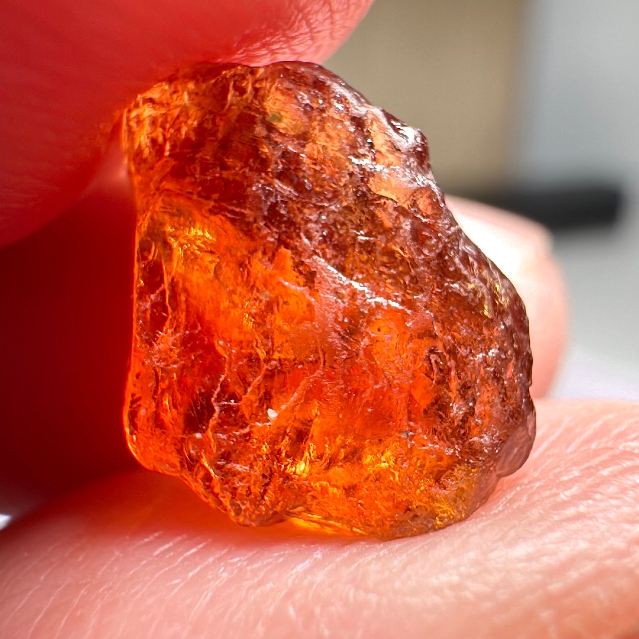 Mandarin Carrot Colour Spessartite Garnet, 5.51ct, Loliondo, Tanzania. Untreated Unheated. Slight crack on outside coming 2mm into stone, rest very slight sugar