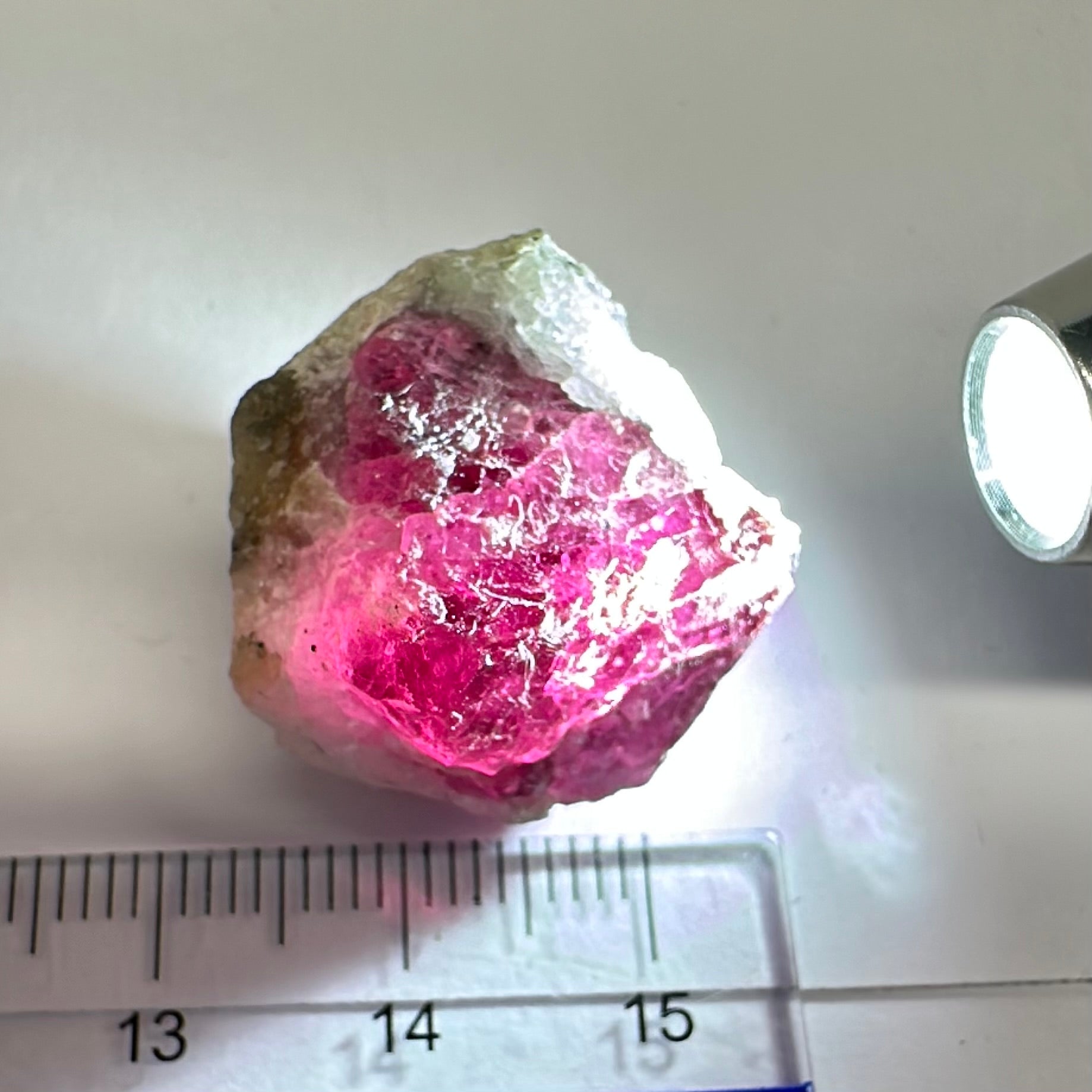 Gemmy portions 55.80ct Mahenge Spinel Crystal, Tanzania, Unheated Unheated, see the pictures with the light shined in