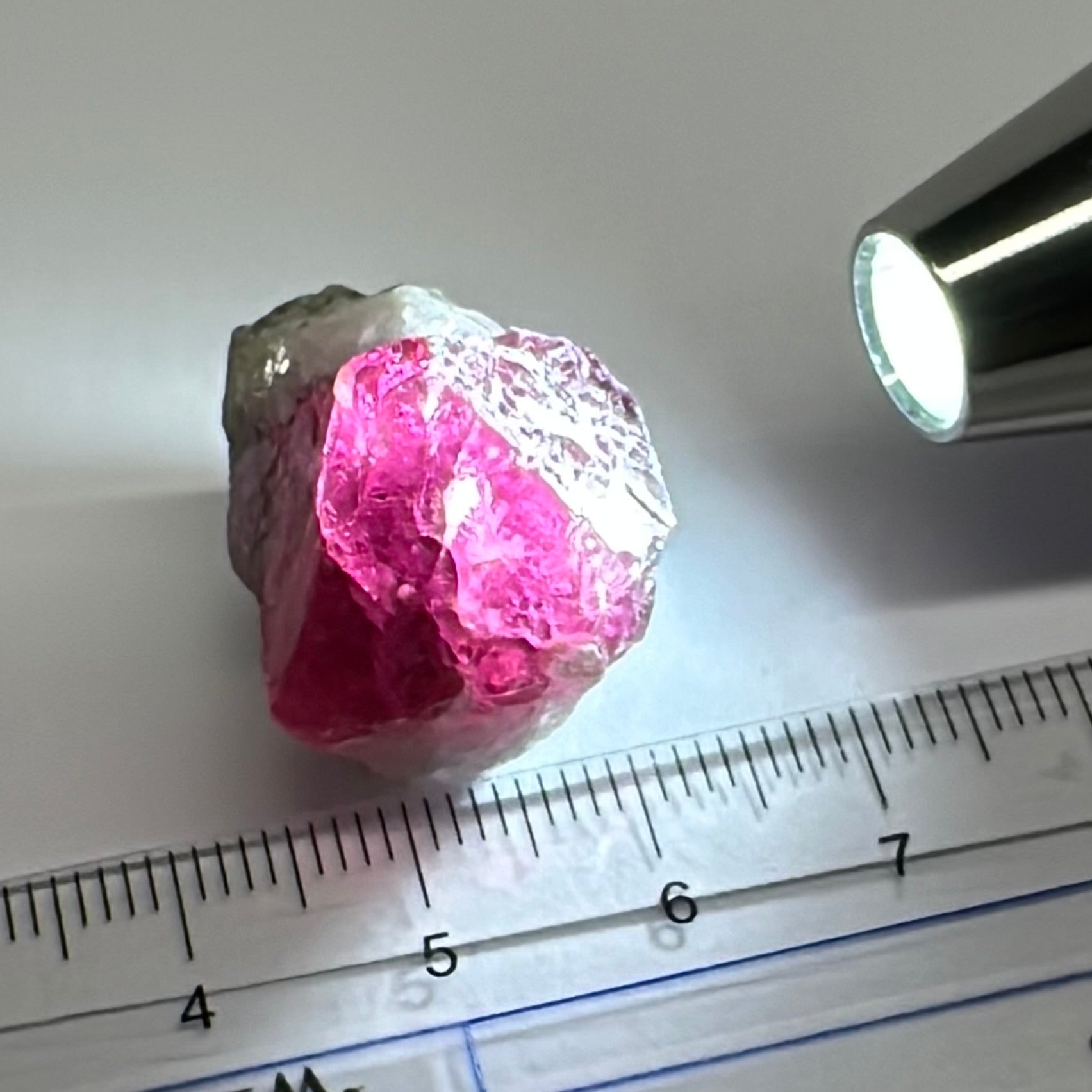 Gemmy portions 55.80ct Mahenge Spinel Crystal, Tanzania, Unheated Unheated, see the pictures with the light shined in