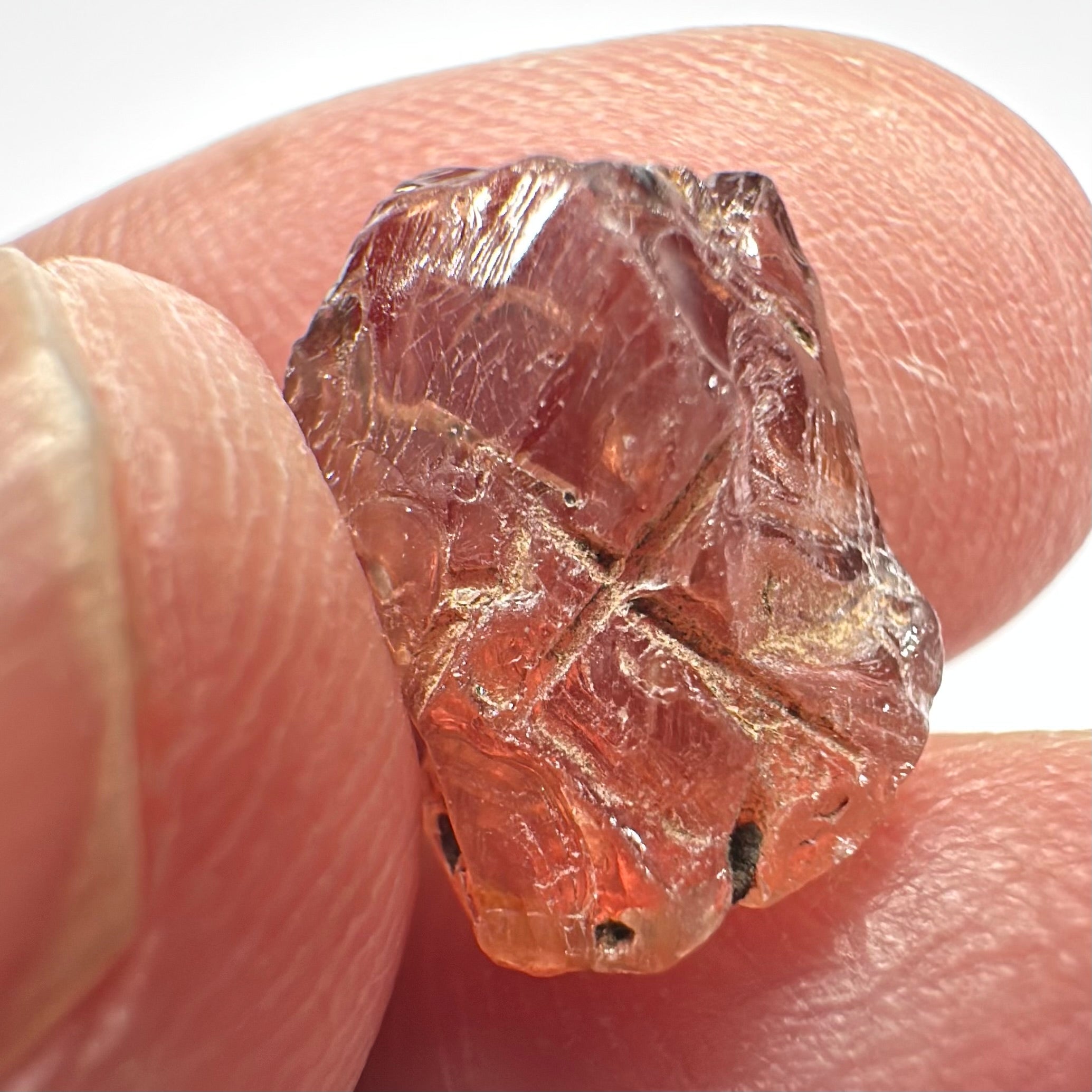 Malaya Garnet, Very Interesting Hollow Pipe inclusions, see all the pictures, 7.38ct, inside vvs-if with slight hollow needle inclusion on the outside, Unheated Untreated, Umba Valley Tanzania