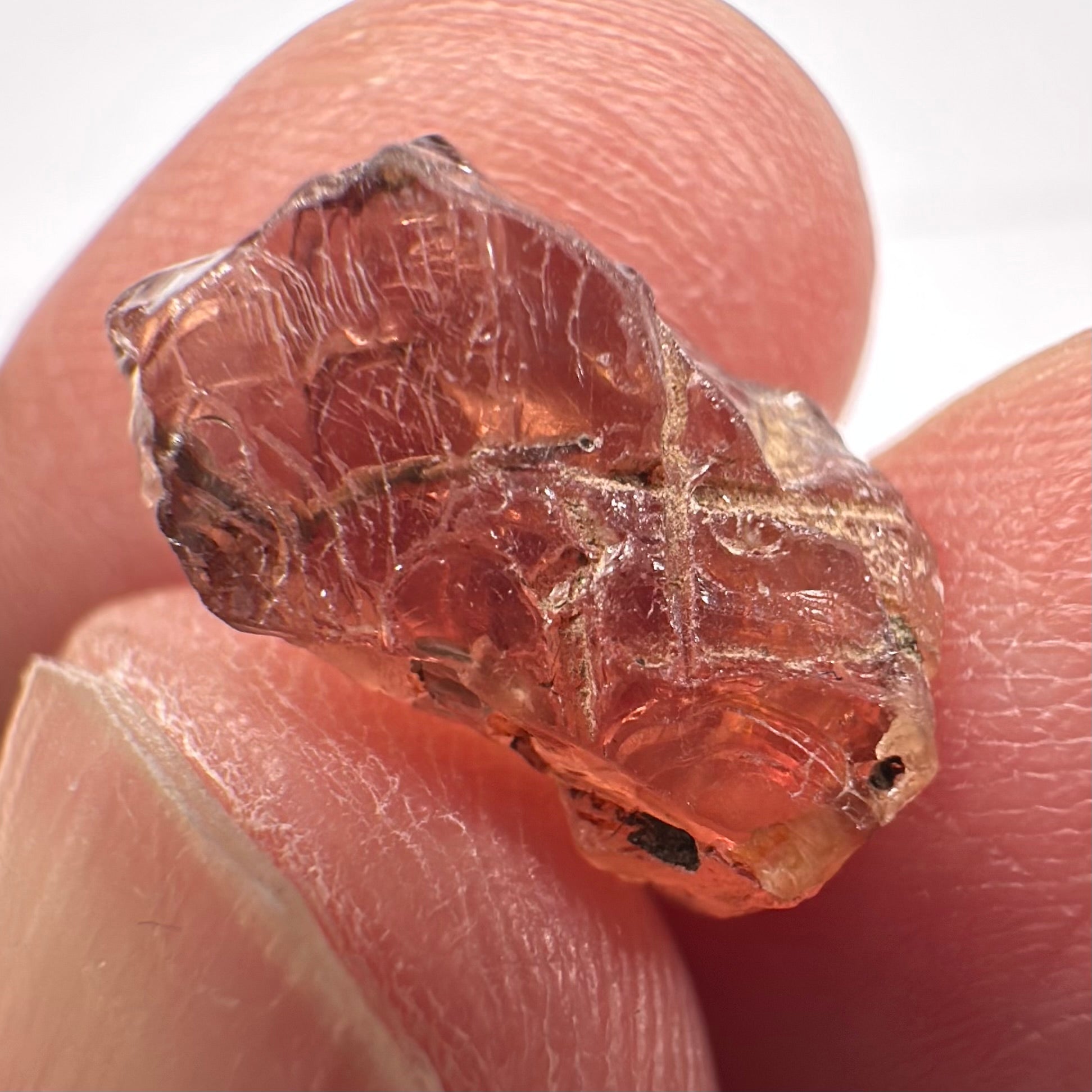 Malaya Garnet, Very Interesting Hollow Pipe inclusions, see all the pictures, 7.38ct, inside vvs-if with slight hollow needle inclusion on the outside, Unheated Untreated, Umba Valley Tanzania