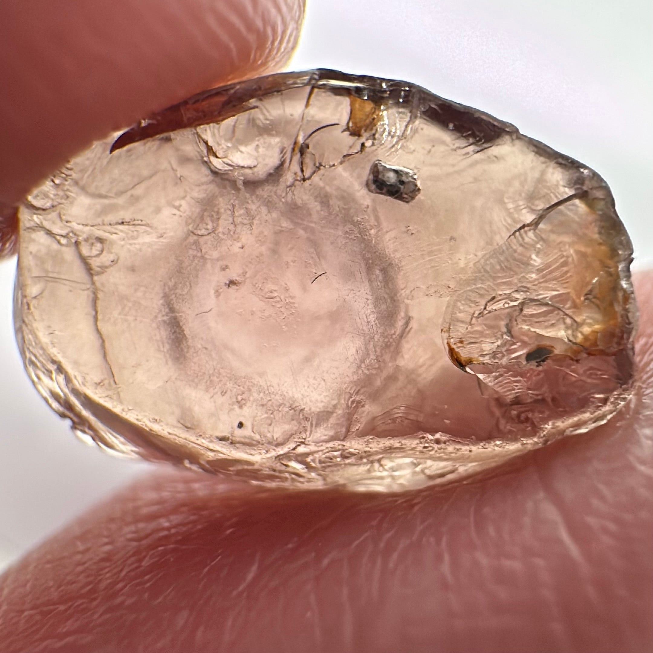 Peach Malaya Garnet, 6.37ct, silk that looks like an eye (see vid.) with a crystal inclusion on the side, flat stone , Unheated Untreated, Umba Valley Tanzania. See pictures to get the exact idea of depth