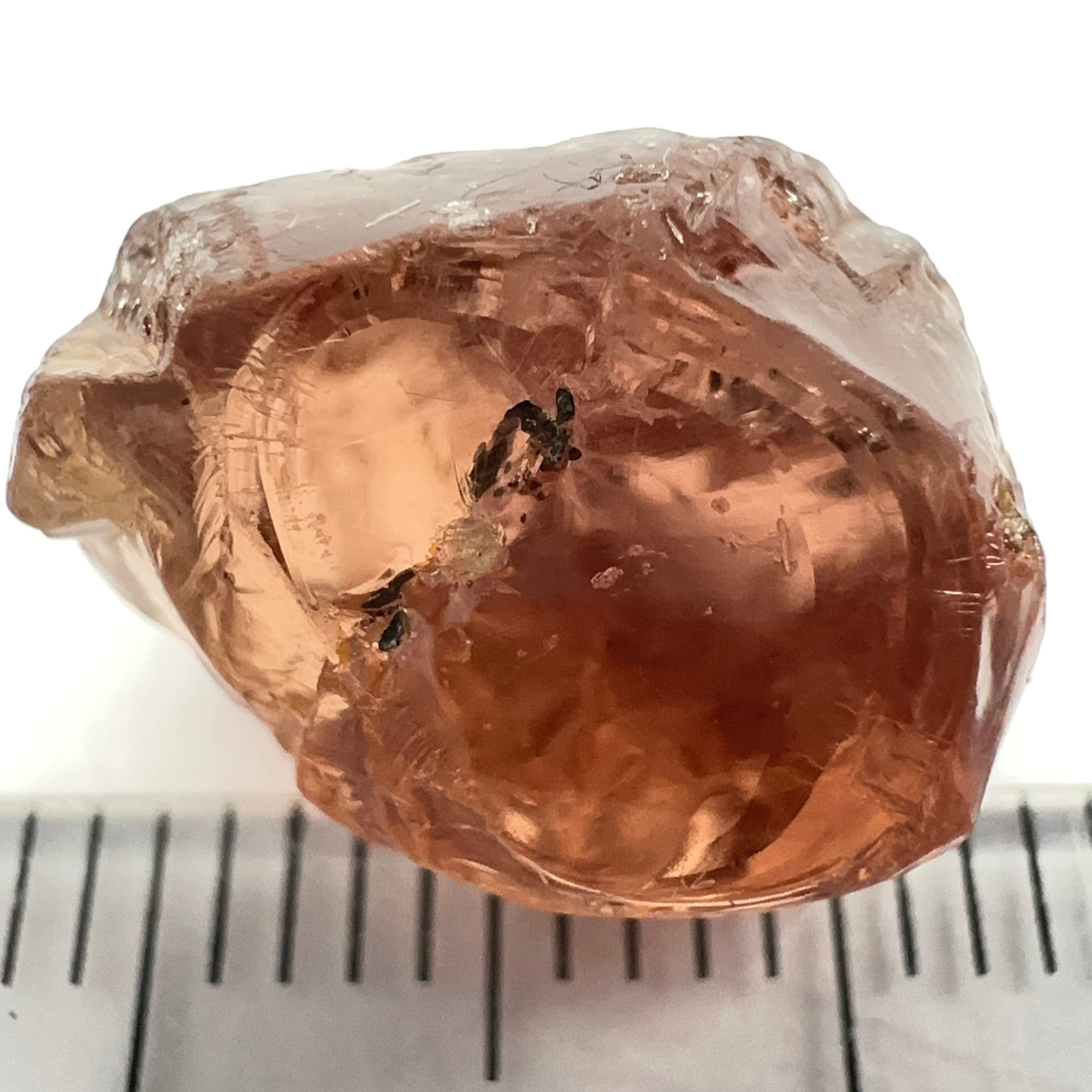 Peach Malaya Garnet, 11.56ct, silk and very fine needles, some inclusions (spots) on the outside of the stone that will come off on preforming,  Unheated Untreated, Umba Valley Tanzania