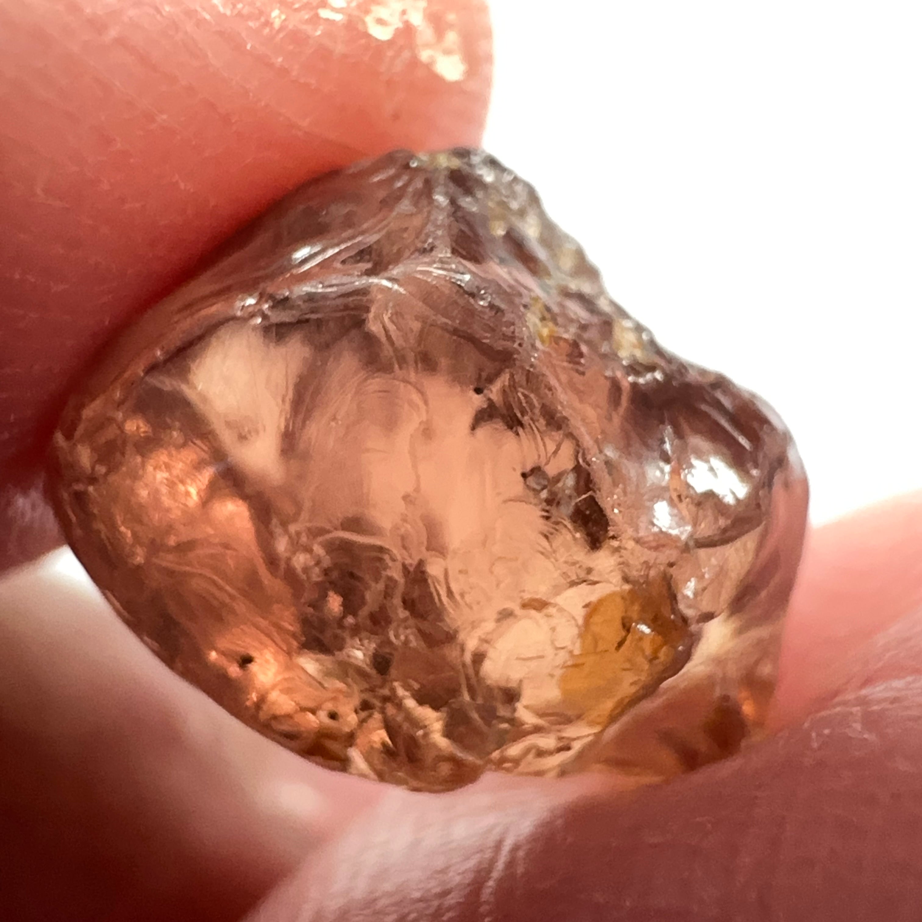 Peach Malaya Garnet, 11.56ct, silk and very fine needles, some inclusions (spots) on the outside of the stone that will come off on preforming,  Unheated Untreated, Umba Valley Tanzania