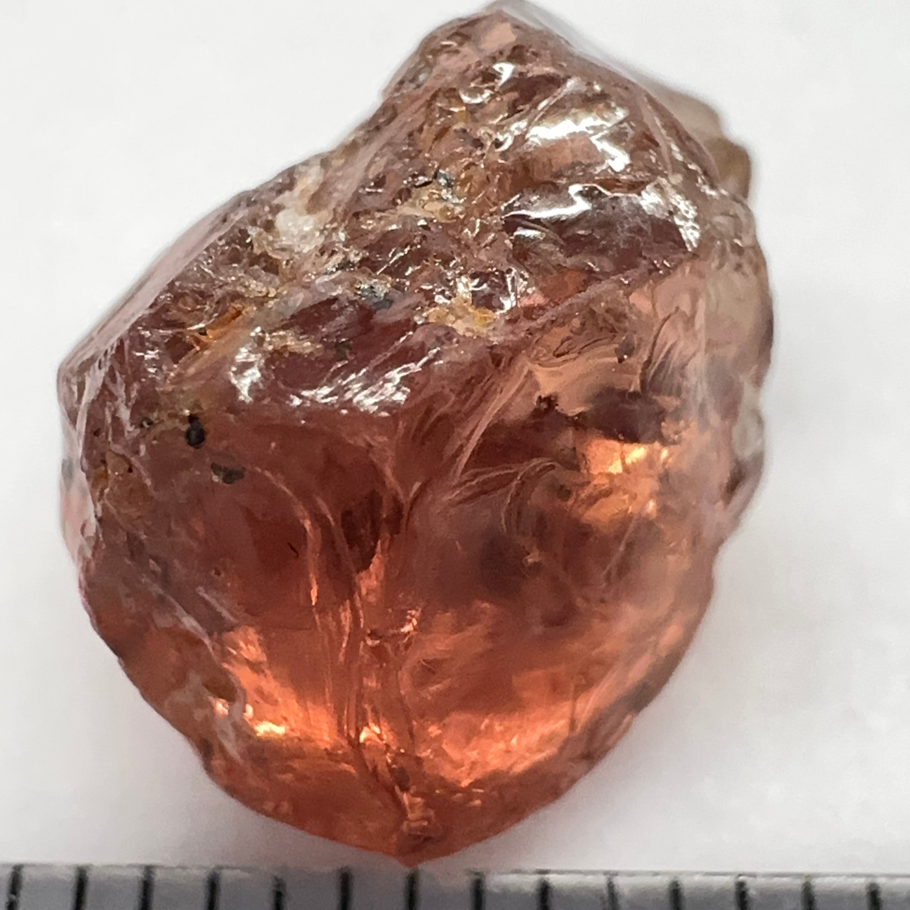 Peach Malaya Garnet, 11.56ct, silk and very fine needles, some inclusions (spots) on the outside of the stone that will come off on preforming,  Unheated Untreated, Umba Valley Tanzania