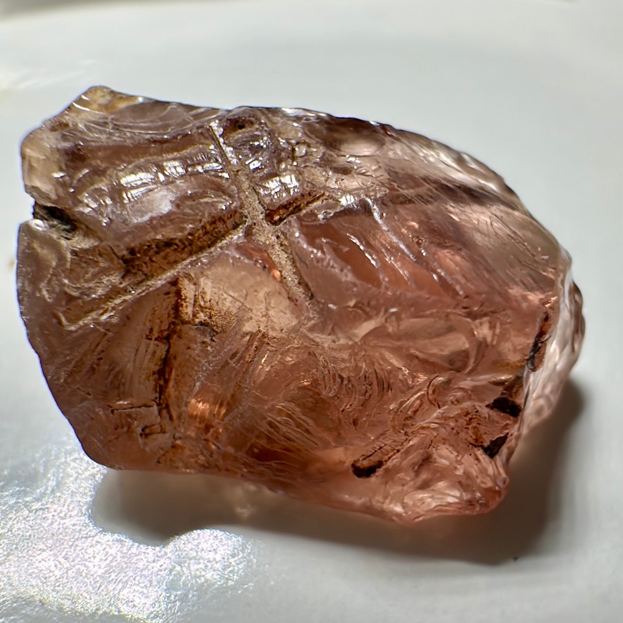 Peach Malaya Garnet, Very Interesting Hollow Pipe inclusions, see all the pictures, 7.38ct, inside vvs-if with slight hollow needle inclusion on the outside, Unheated Untreated, Umba Valley Tanzania