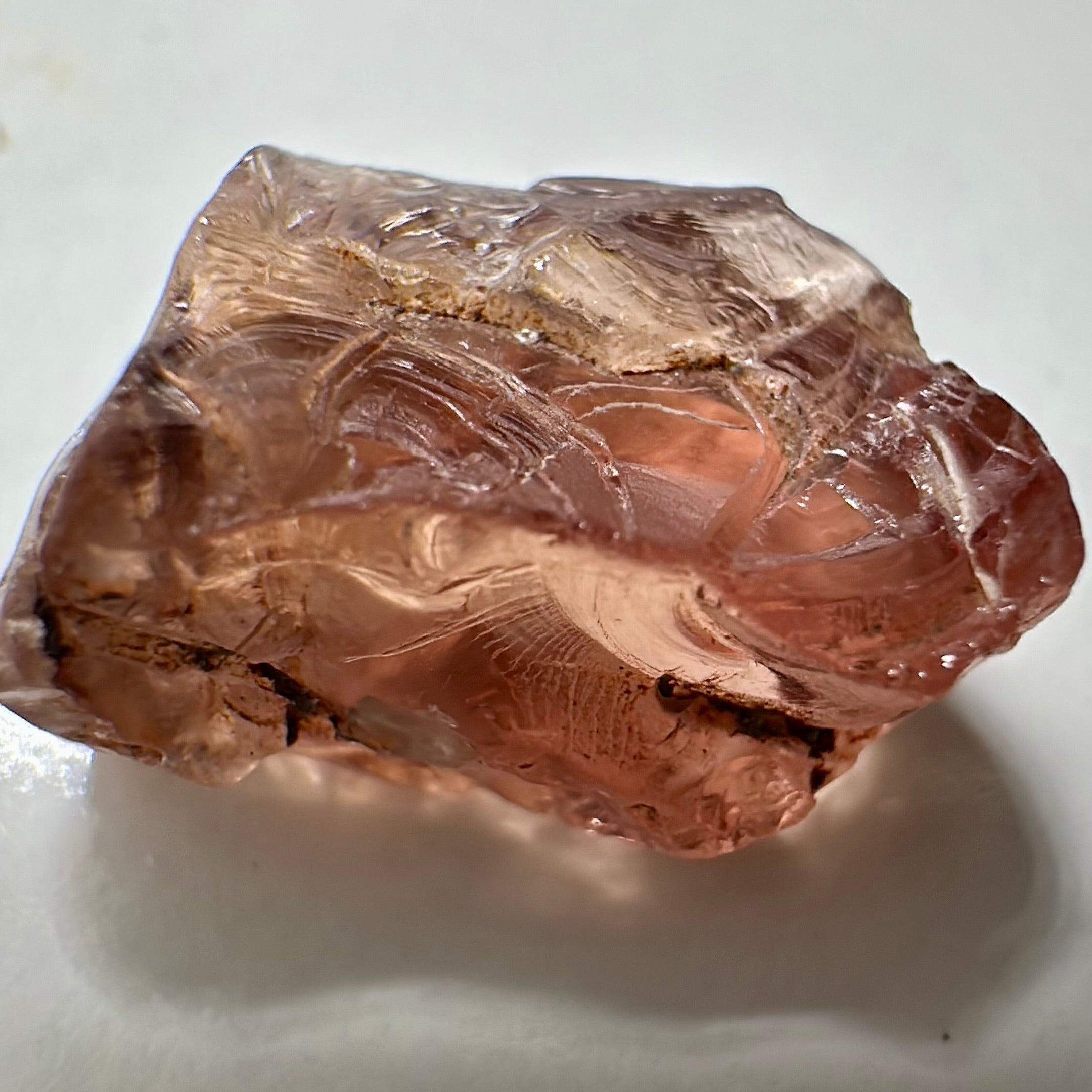 Peach Malaya Garnet, Very Interesting Hollow Pipe inclusions, see all the pictures, 7.38ct, inside vvs-if with slight hollow needle inclusion on the outside, Unheated Untreated, Umba Valley Tanzania