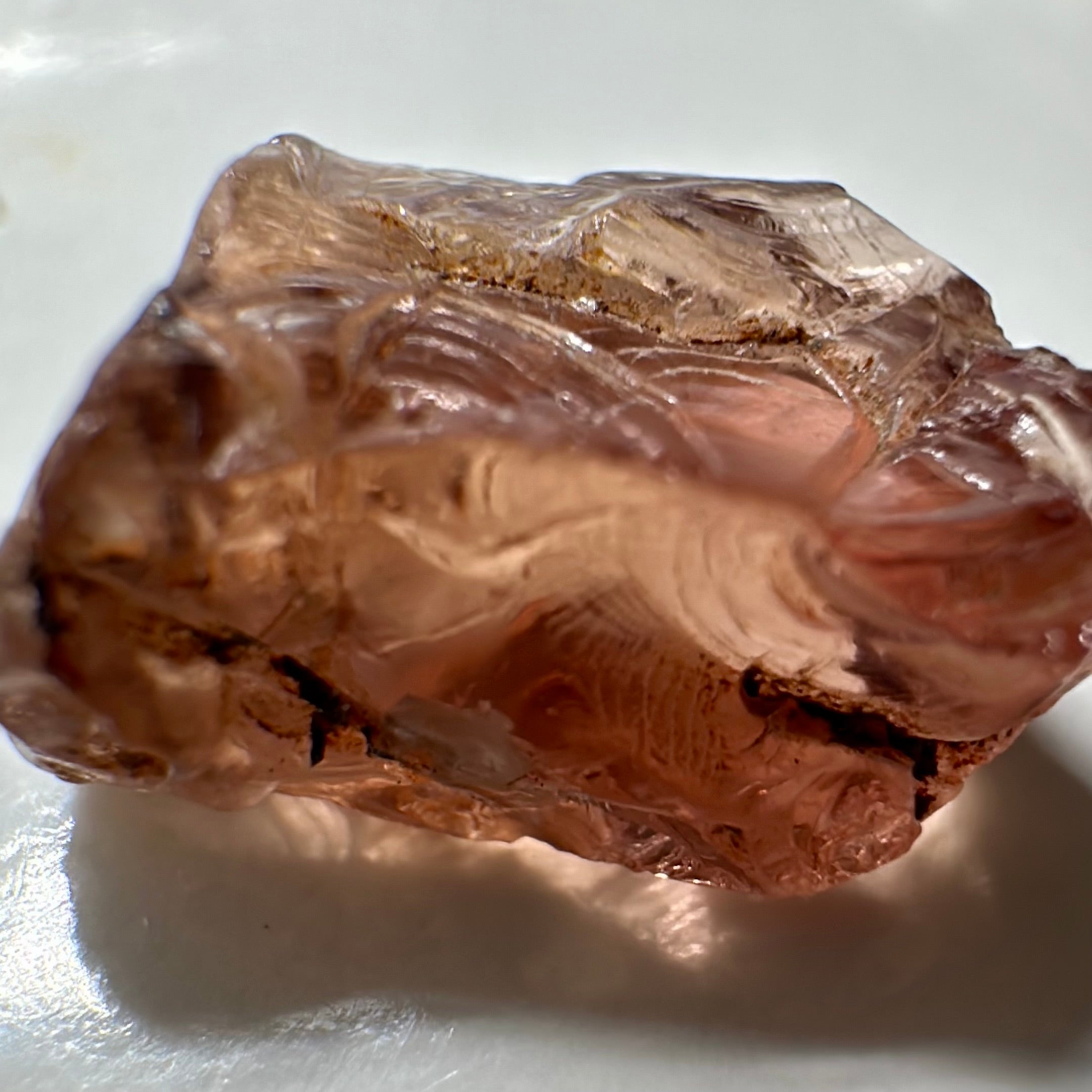 Peach Malaya Garnet, Very Interesting Hollow Pipe inclusions, see all the pictures, 7.38ct, inside vvs-if with slight hollow needle inclusion on the outside, Unheated Untreated, Umba Valley Tanzania