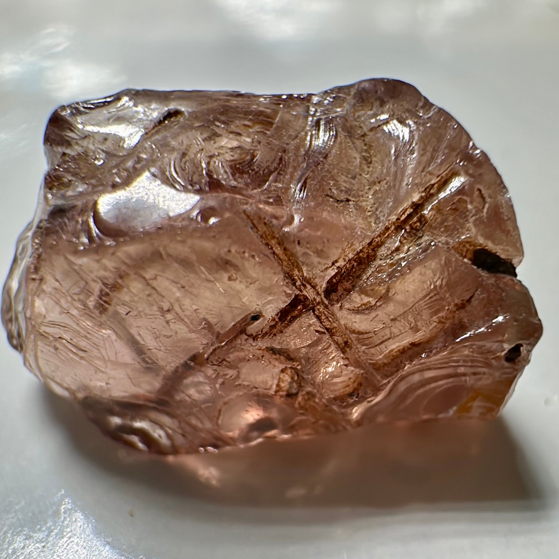 Peach Malaya Garnet, Very Interesting Hollow Pipe inclusions, see all the pictures, 7.38ct, inside vvs-if with slight hollow needle inclusion on the outside, Unheated Untreated, Umba Valley Tanzania