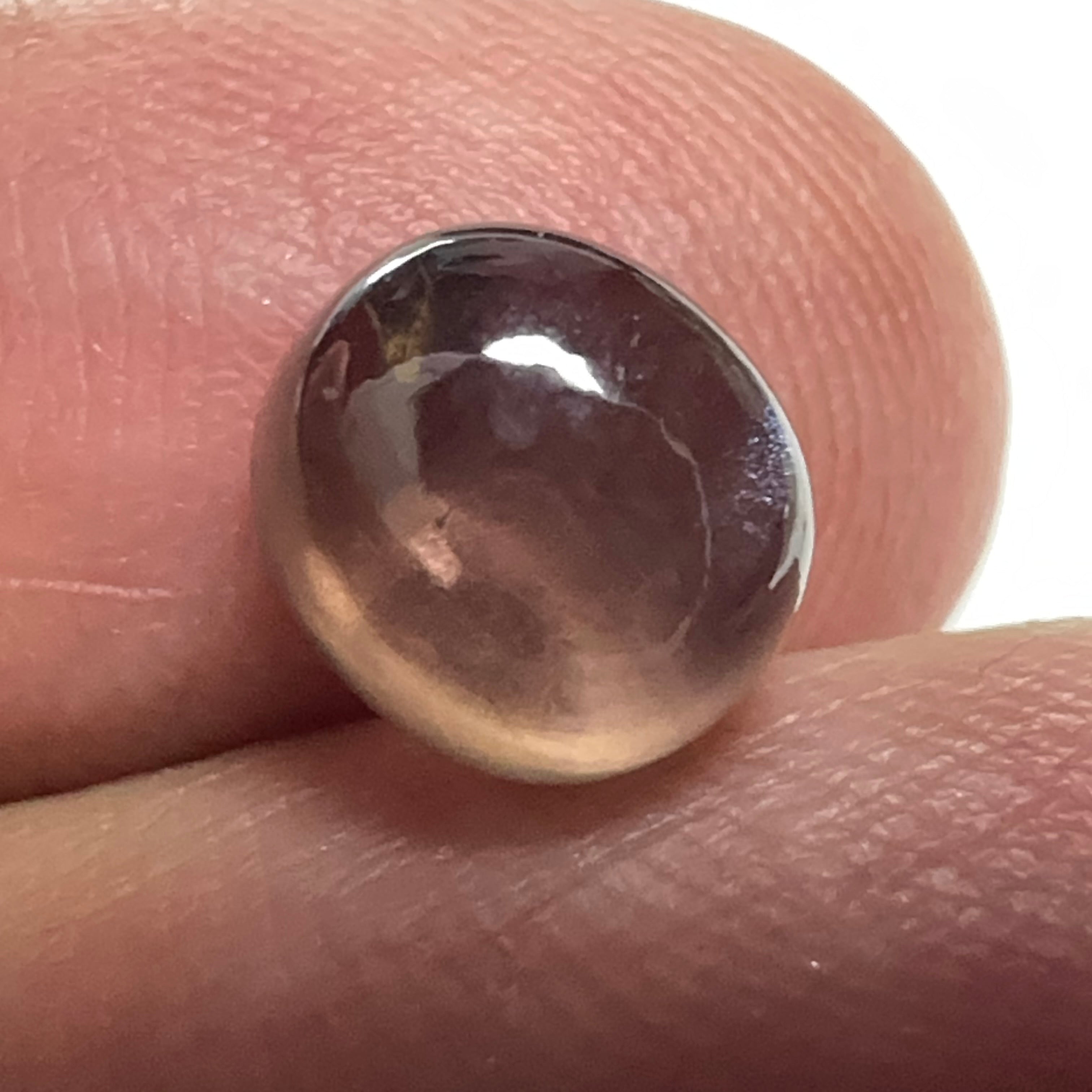 3.52ct Colour Change Sapphire Cabochon, Umba Valley, Tanzania. Untreated Unheated. Seems to have silk that appears as a moving spot