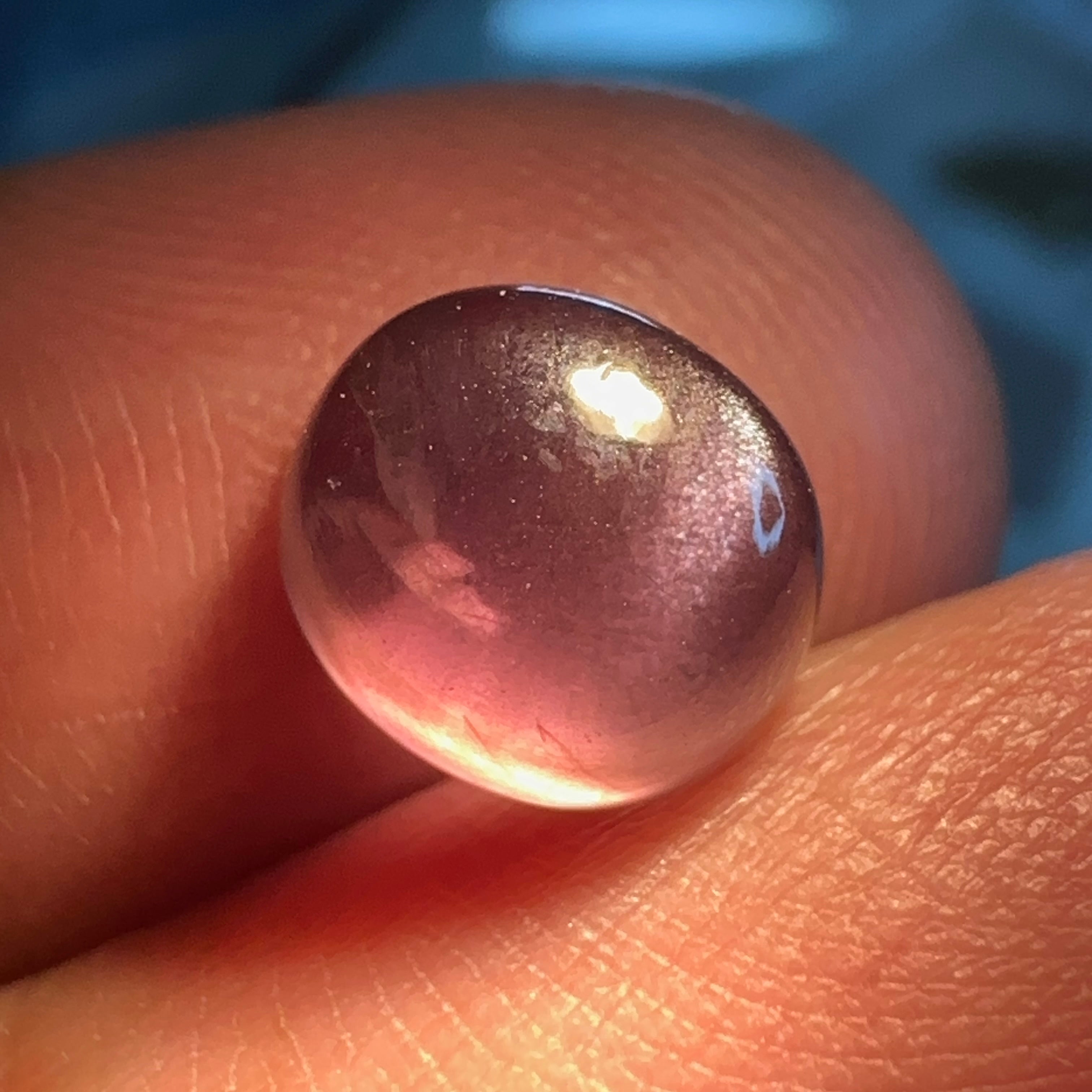 3.52ct Colour Change Sapphire Cabochon, Umba Valley, Tanzania. Untreated Unheated. Seems to have silk that appears as a moving spot