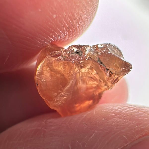 Peach Malaya Garnet, 8.21ct, silk and slight needles but no inclusions, Unheated Untreated, Umba Valley Tanzania, complicated shape.