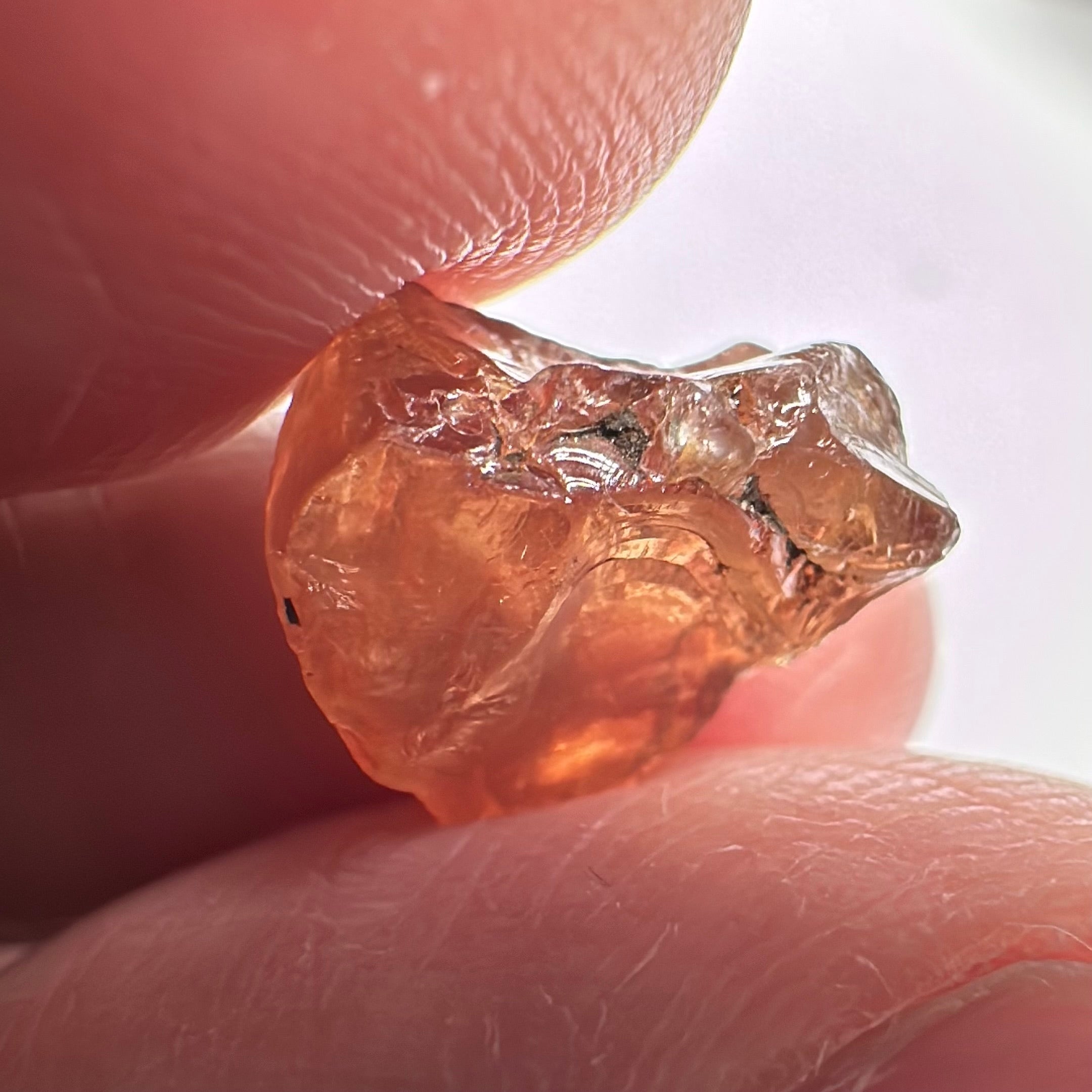 Peach Malaya Garnet, 8.21ct, silk and slight needles but no inclusions, Unheated Untreated, Umba Valley Tanzania, complicated shape.