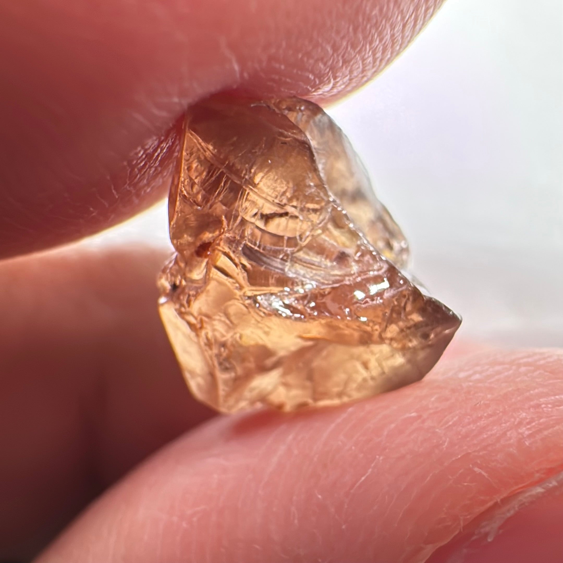 Peach Malaya Garnet, 8.21ct, silk and slight needles but no inclusions, Unheated Untreated, Umba Valley Tanzania, complicated shape.