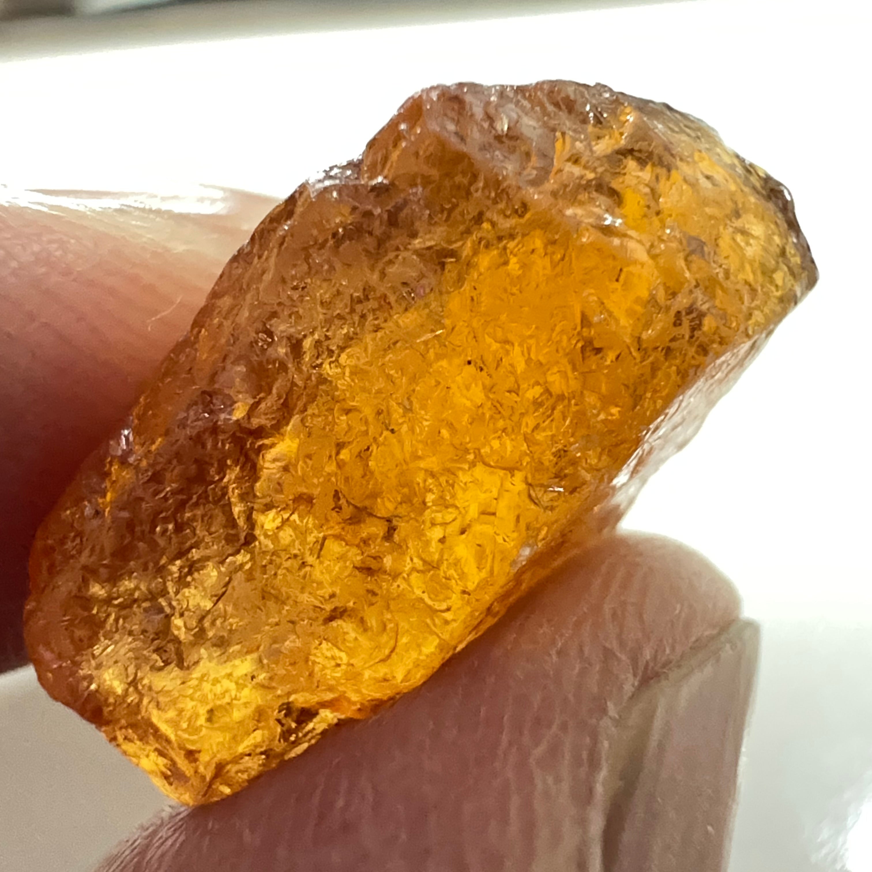 17.77ct Mandarin Spessartite Garnet, Loliondo, Tanzania. Untreated Unheated. Slight 2mm inclusion on one end of the stone rest slight sugar