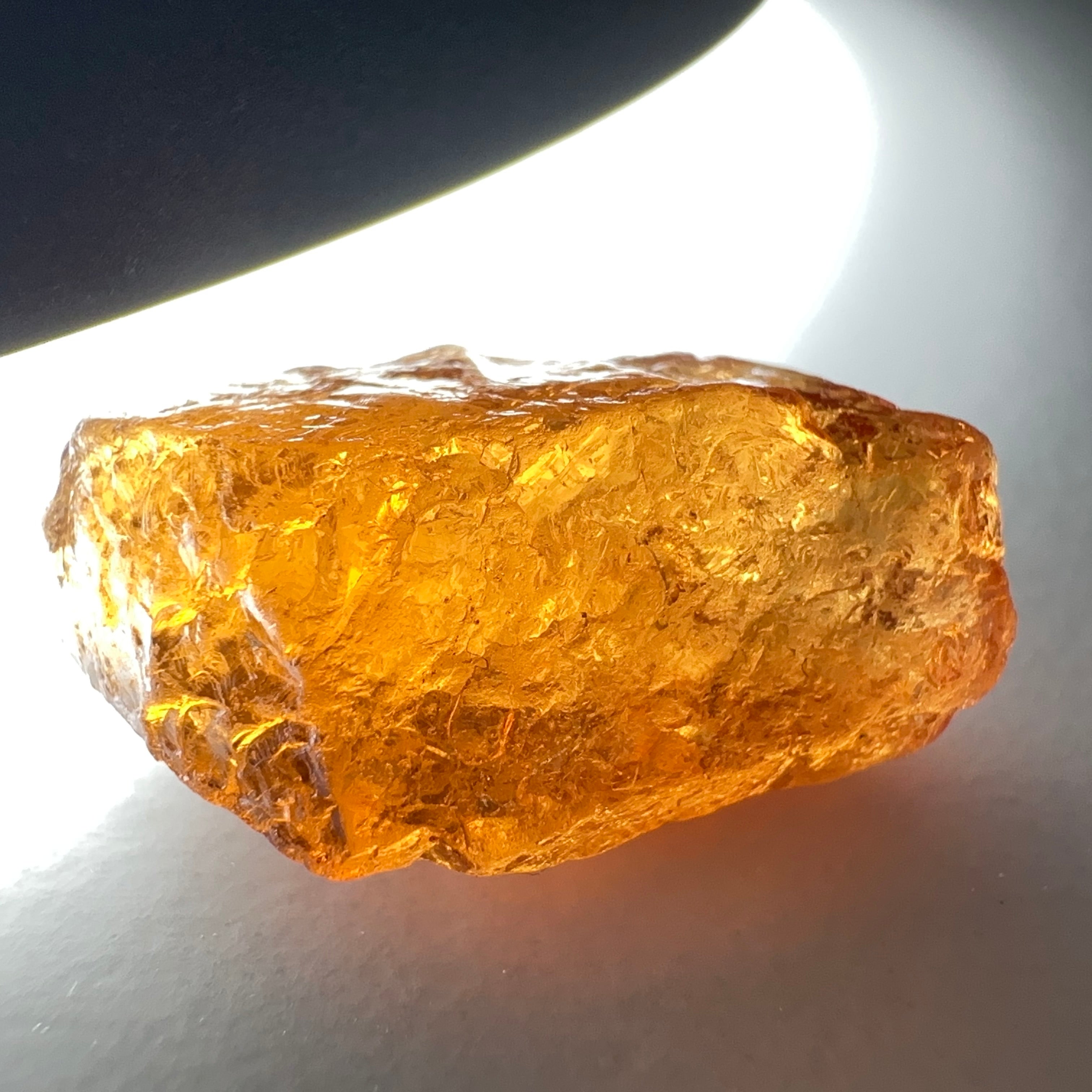 17.77ct Mandarin Spessartite Garnet, Loliondo, Tanzania. Untreated Unheated. Slight 2mm inclusion on one end of the stone rest slight sugar