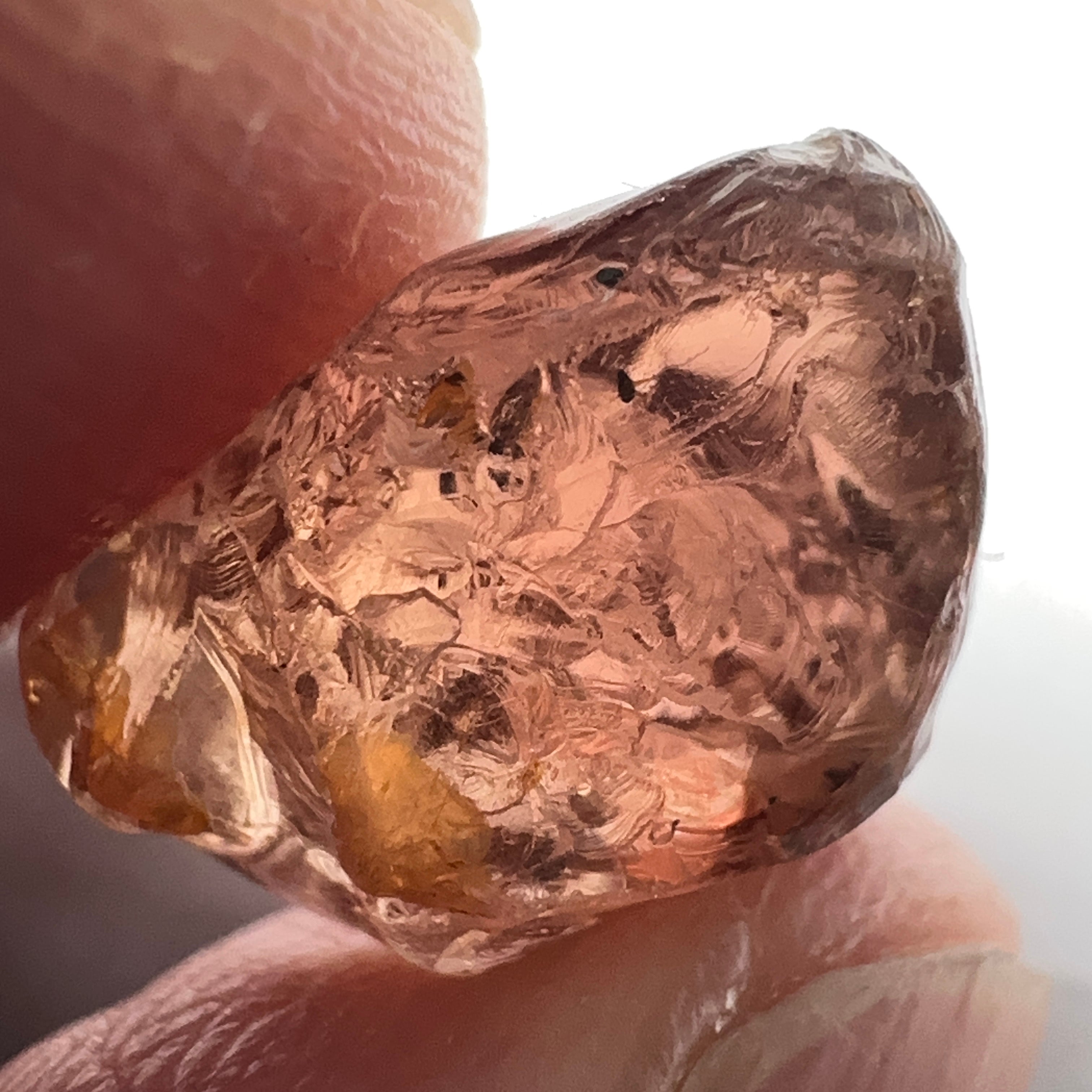 Peach Malaya Garnet, 11.56ct, silk and very fine needles, some inclusions (spots) on the outside of the stone that will come off on preforming,  Unheated Untreated, Umba Valley Tanzania