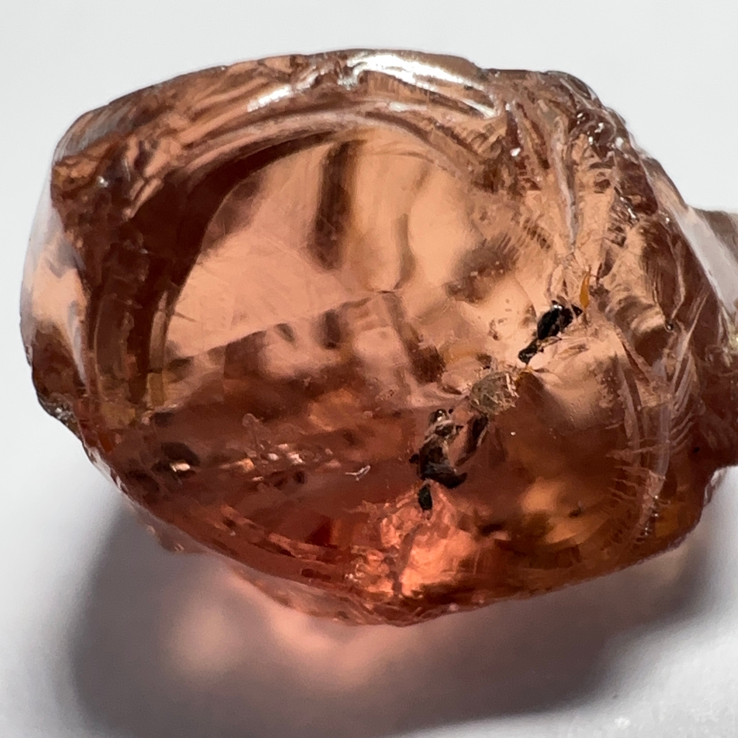 Peach Malaya Garnet, 11.56ct, silk and very fine needles, some inclusions (spots) on the outside of the stone that will come off on preforming,  Unheated Untreated, Umba Valley Tanzania