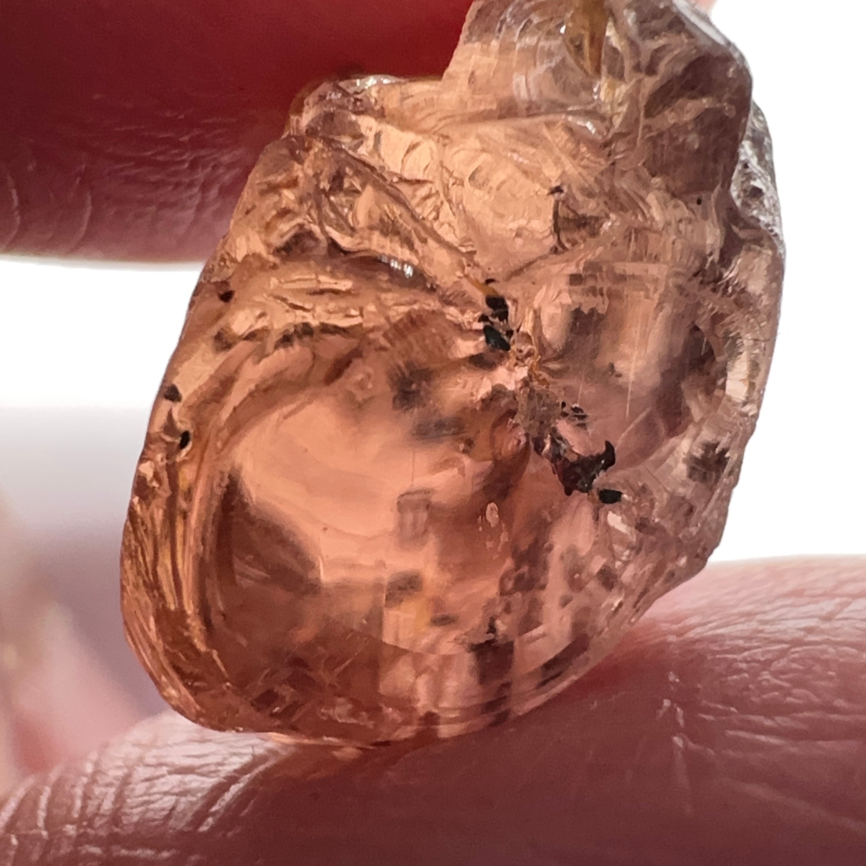 Peach Malaya Garnet, 11.56ct, silk and very fine needles, some inclusions (spots) on the outside of the stone that will come off on preforming,  Unheated Untreated, Umba Valley Tanzania