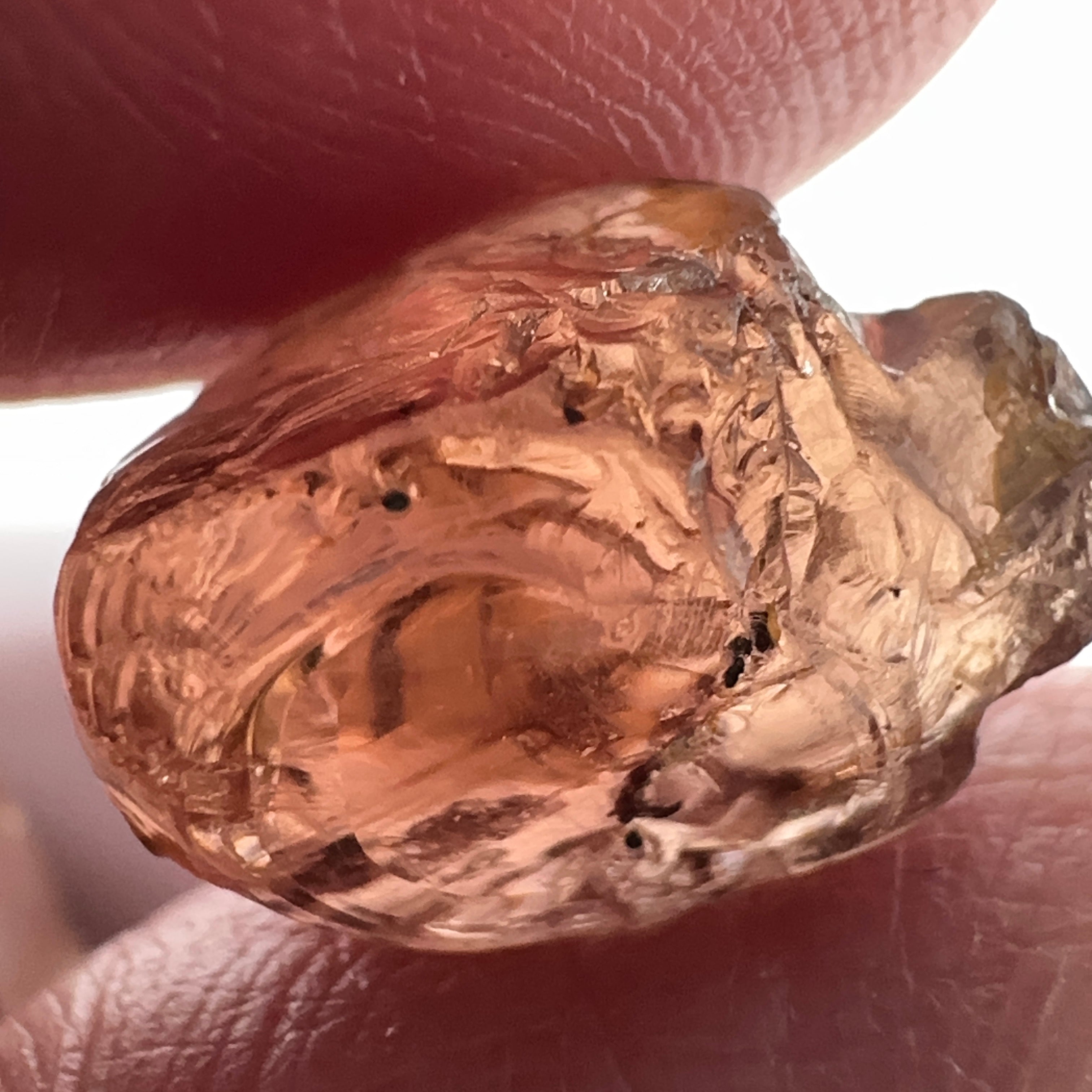 Peach Malaya Garnet, 11.56ct, silk and very fine needles, some inclusions (spots) on the outside of the stone that will come off on preforming,  Unheated Untreated, Umba Valley Tanzania