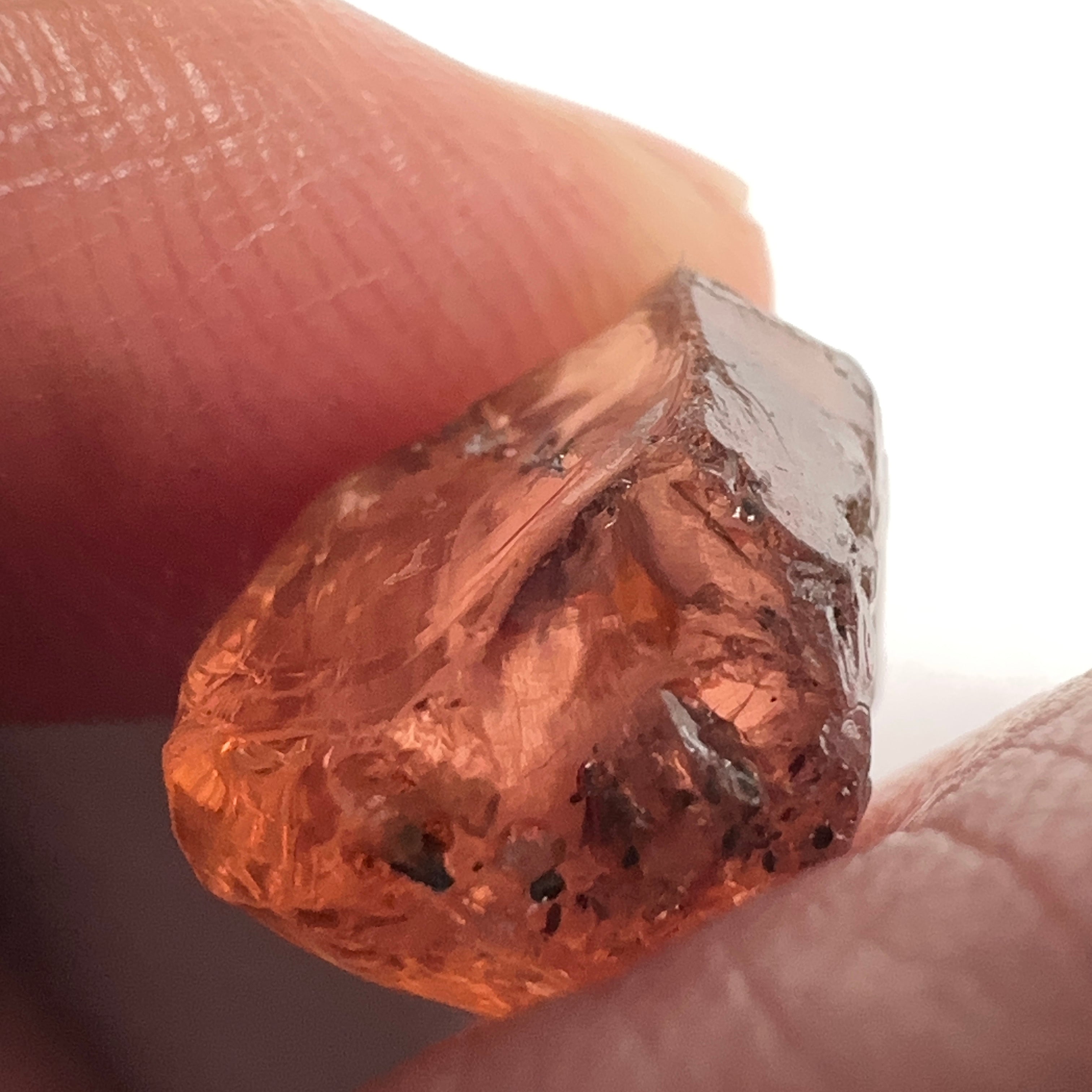 Peach Malaya Garnet, 11.56ct, silk and very fine needles, some inclusions (spots) on the outside of the stone that will come off on preforming,  Unheated Untreated, Umba Valley Tanzania